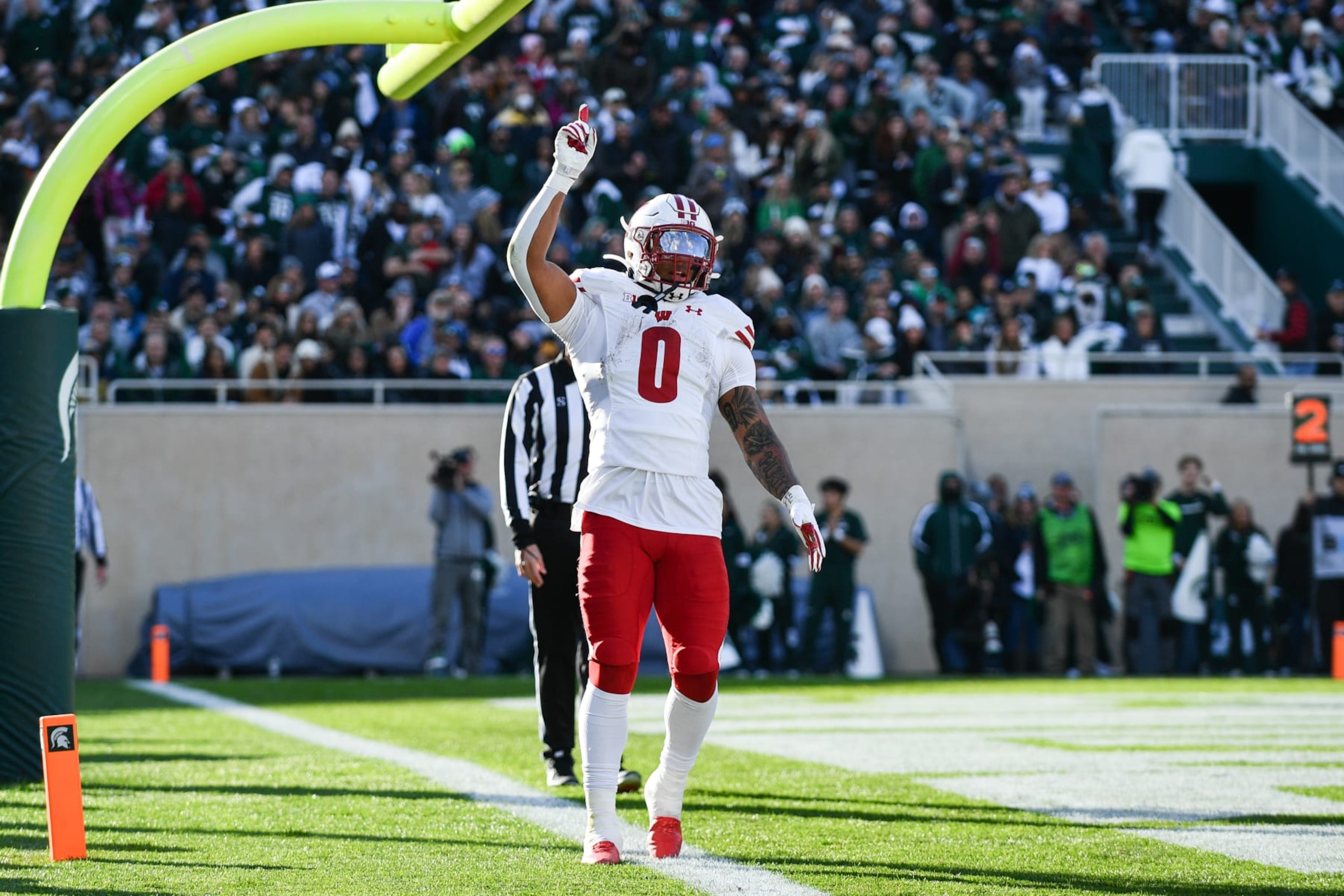 EAST LANSING, MI - OCTOBER 15: Wisconsin Badgers running back Braelon Allen (0) celebrates a touchdown during a college football game between the Michigan State Spartans and Wisconsin Badgers on October 15, 2022 at Spartan Stadium in East Lansing, MI (Photo by Adam Ruff/Icon Sportswire via Getty Images)