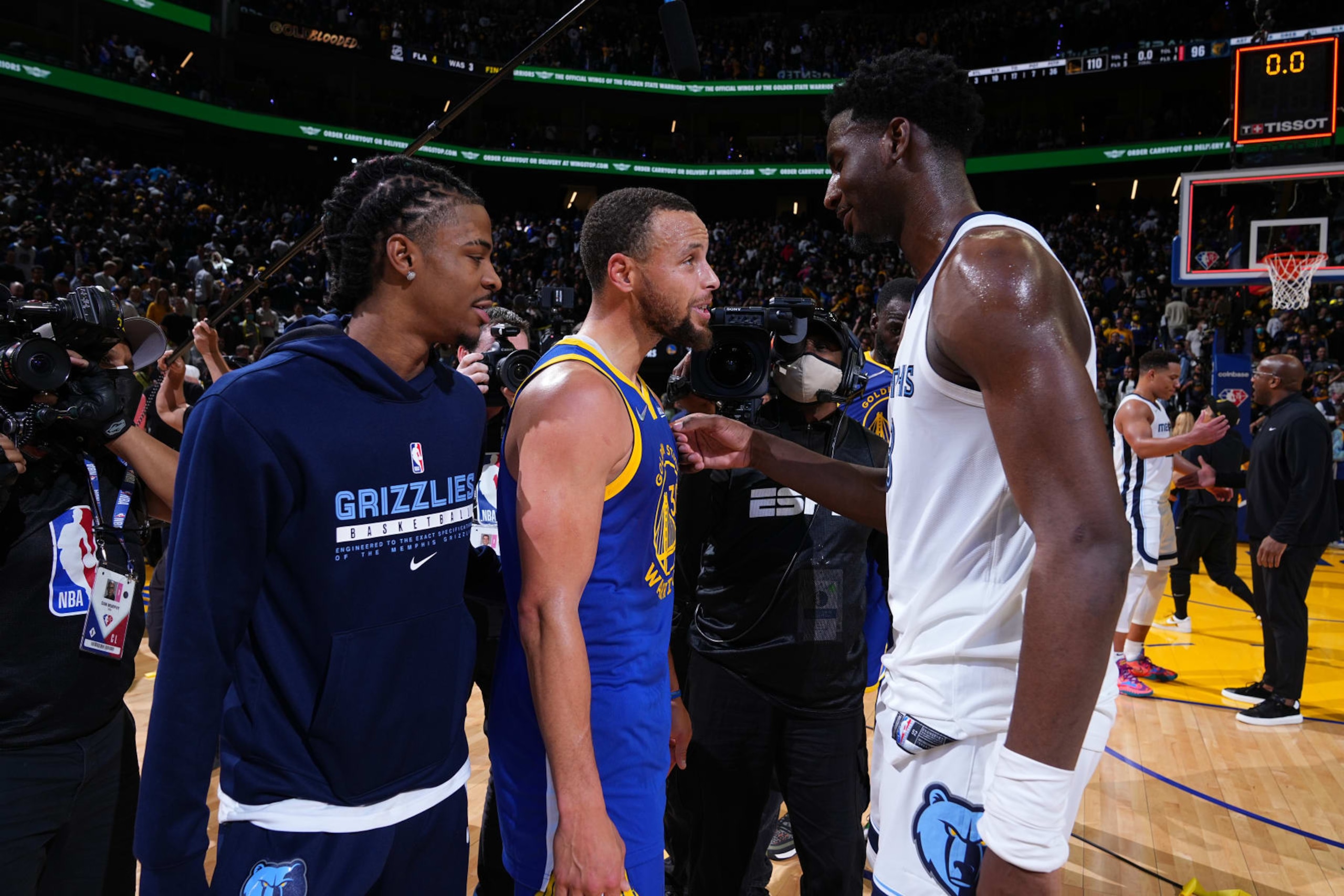 SAN FRANCISCO, CA - MAY 13: Stephen Curry #30 of the Golden State Warriors and Jaren Jackson Jr. #13 of the Memphis Grizzlies embrace after the game during Game 6 of the 2022 NBA Playoffs Western Conference Semifinals on May 13, 2022 at Chase Center in San Francisco, California. NOTE TO USER: User expressly acknowledges and agrees that, by downloading and or using this photograph, user is consenting to the terms and conditions of Getty Images License Agreement. Mandatory Copyright Notice: Copyright 2022 NBAE (Photo by Garrett Ellwood/NBAE via Getty Images)