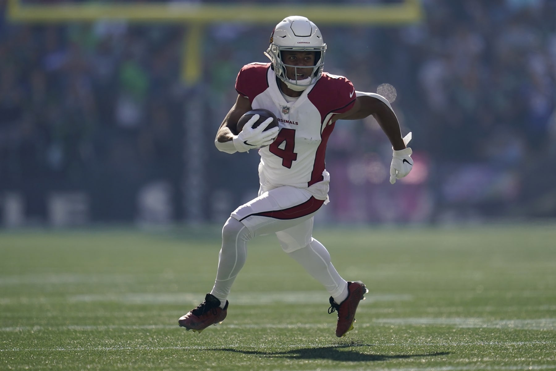 Arizona Cardinals wide receiver Rondale Moore (4) runs against the Seattle Seahawks during the first half of an NFL football game in Seattle, Sunday, Oct. 16, 2022. (AP Photo/Abbie Parr)