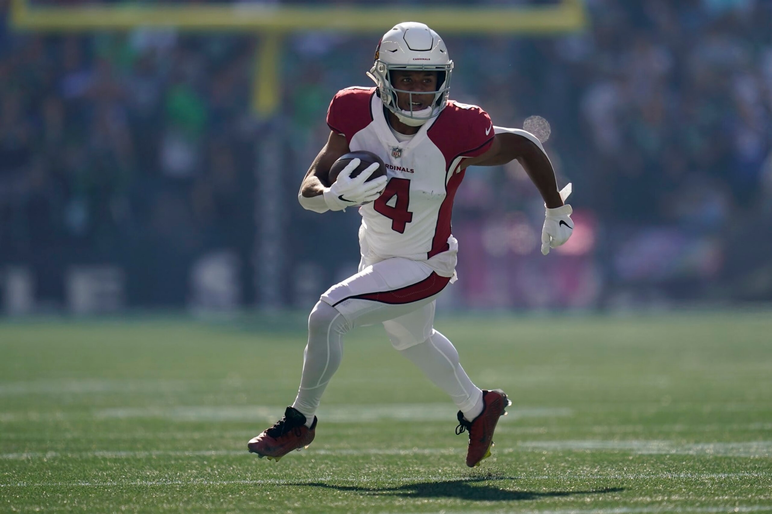 Arizona Cardinals wide receiver Rondale Moore (4) runs against the Seattle Seahawks during the first half of an NFL football game in Seattle, Sunday, Oct. 16, 2022. (AP Photo/Abbie Parr)