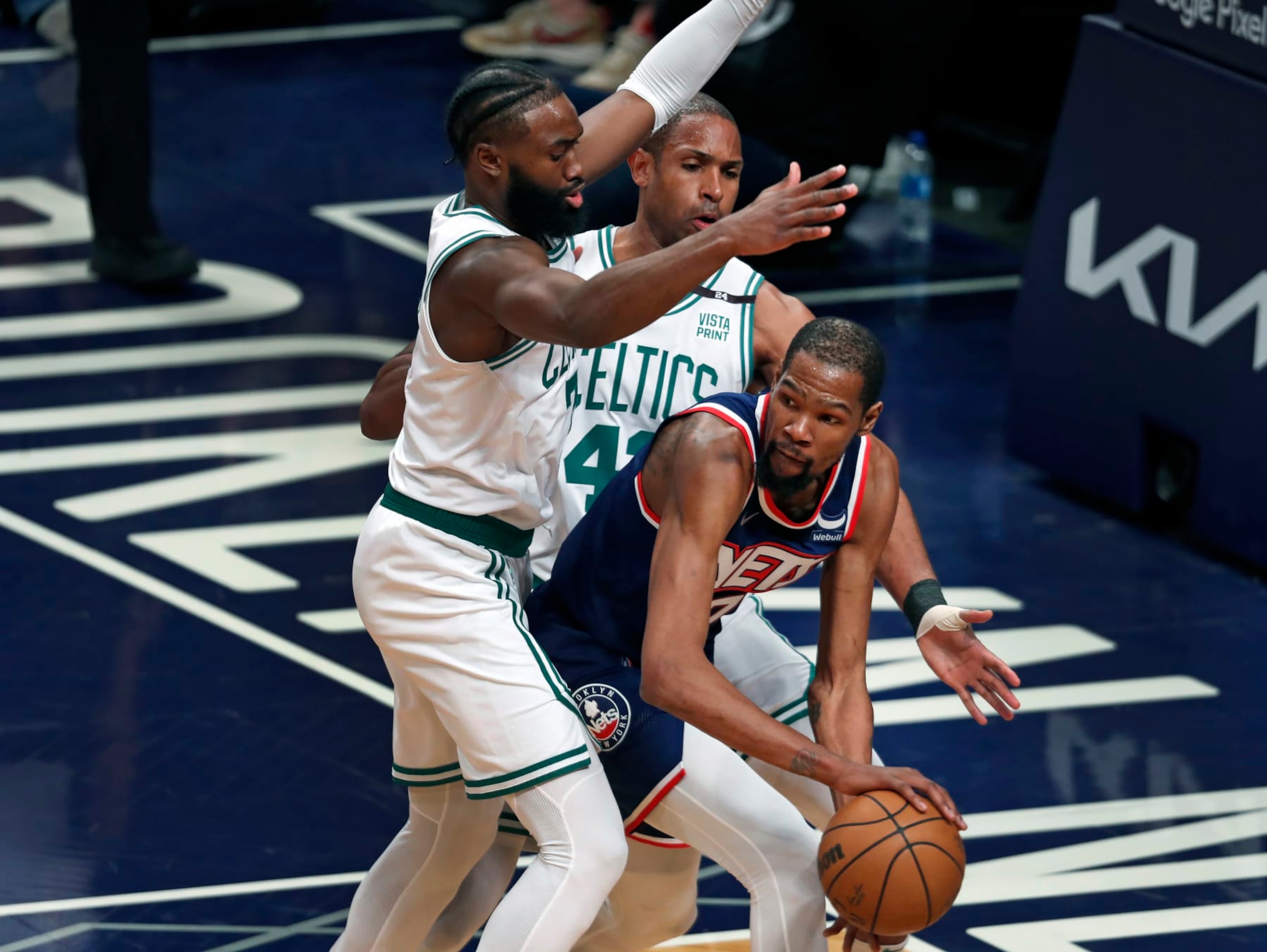 Brooklyn - April 25: The Celtics Jaylen Brown and Al Horford double team the Nets Kevin Durant in the first quarter. The Boston Celtics visited the Brooklyn Nets for Game Four of their first round NBA playoff series at Barclays Center in Brooklyn, NY on April 25, 2022. (Photo by Jim Davis/The Boston Globe via Getty Images) Brooklyn - April 25: The Celtics Jaylen Brown and Al Horford double team the Nets Kevin Durant in the first quarter. The Boston Celtics visited the Brooklyn Nets for Game Four of their first round NBA playoff series at Barclays Center in Brooklyn, NY on April 25, 2022. (Photo by Jim Davis/The Boston Globe via Getty Images)