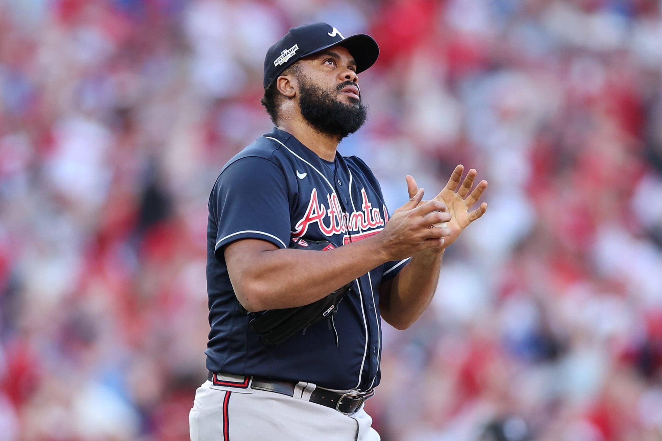 PHILADELPHIA, PENNSYLVANIA - OCTOBER 15: Kenley Jansen #74 of the Atlanta Braves reacts to a home run by Bryce Harper #3 of the Philadelphia Phillies during the eighth inning in game four of the National League Division Series at Citizens Bank Park on October 15, 2022 in Philadelphia, Pennsylvania. (Photo by Patrick Smith/Getty Images)