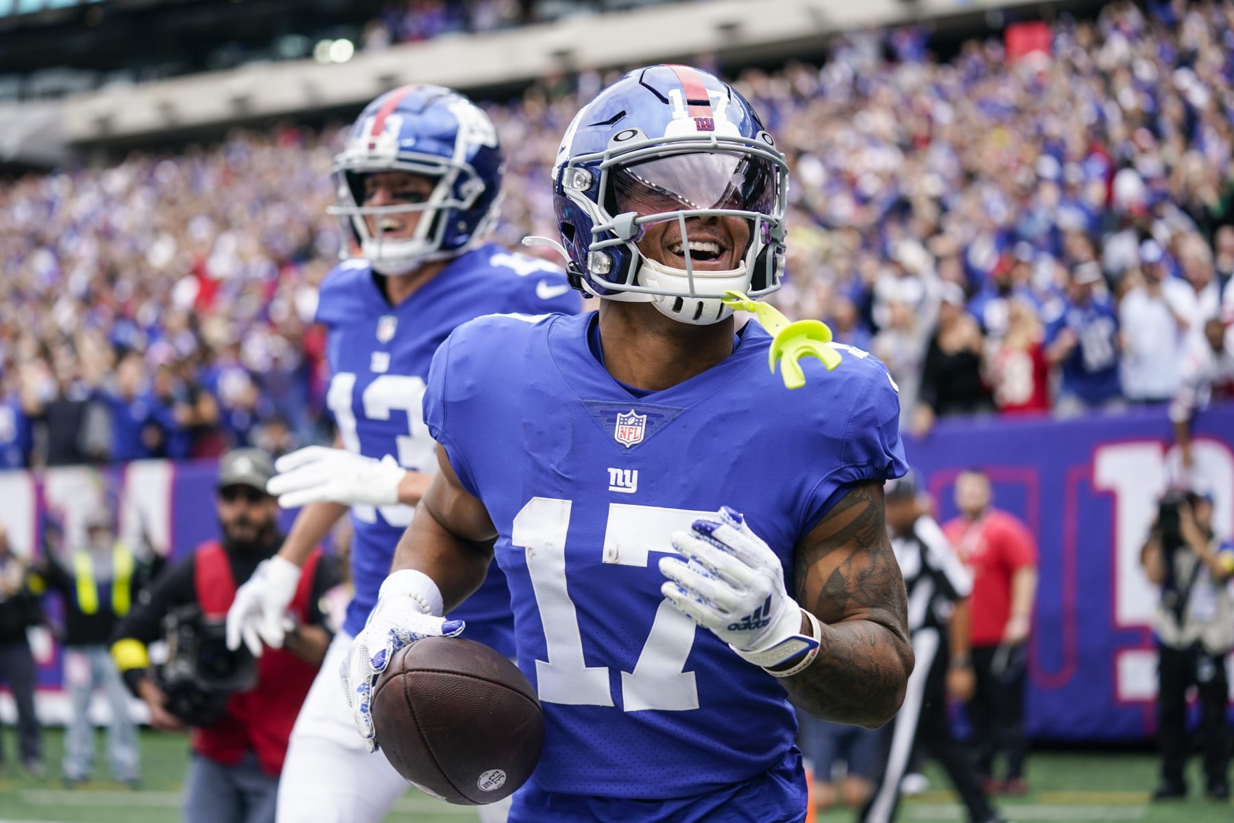 New York Giants wide receiver Wan'Dale Robinson (17) celebrates after scoring a touchdown during the first half of an NFL football game against the Baltimore Ravens Sunday, Oct. 16, 2022, in East Rutherford, N.J. (AP Photo/Seth Wenig)