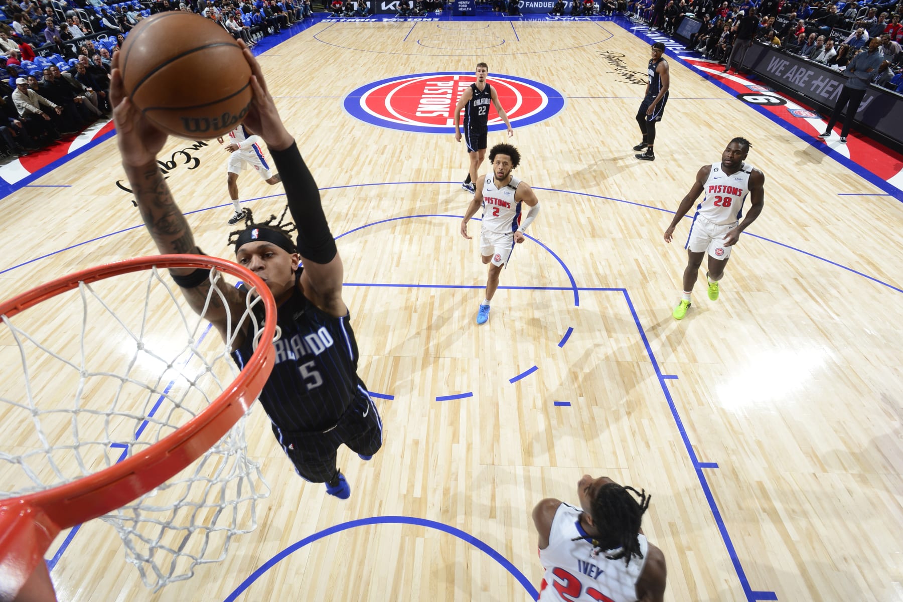 DETROIT, MI - OCTOBER 19: Paolo Banchero #5 of the Orlando Magic drives to the basket during the game against the Detroit Pistons on October 19, 2022 at Little Caesars Arena in Detroit, Michigan. NOTE TO USER: User expressly acknowledges and agrees that, by downloading and/or using this photograph, User is consenting to the terms and conditions of the Getty Images License Agreement. Mandatory Copyright Notice: Copyright 2022 NBAE (Photo by Chris Schwegler/NBAE via Getty Images)