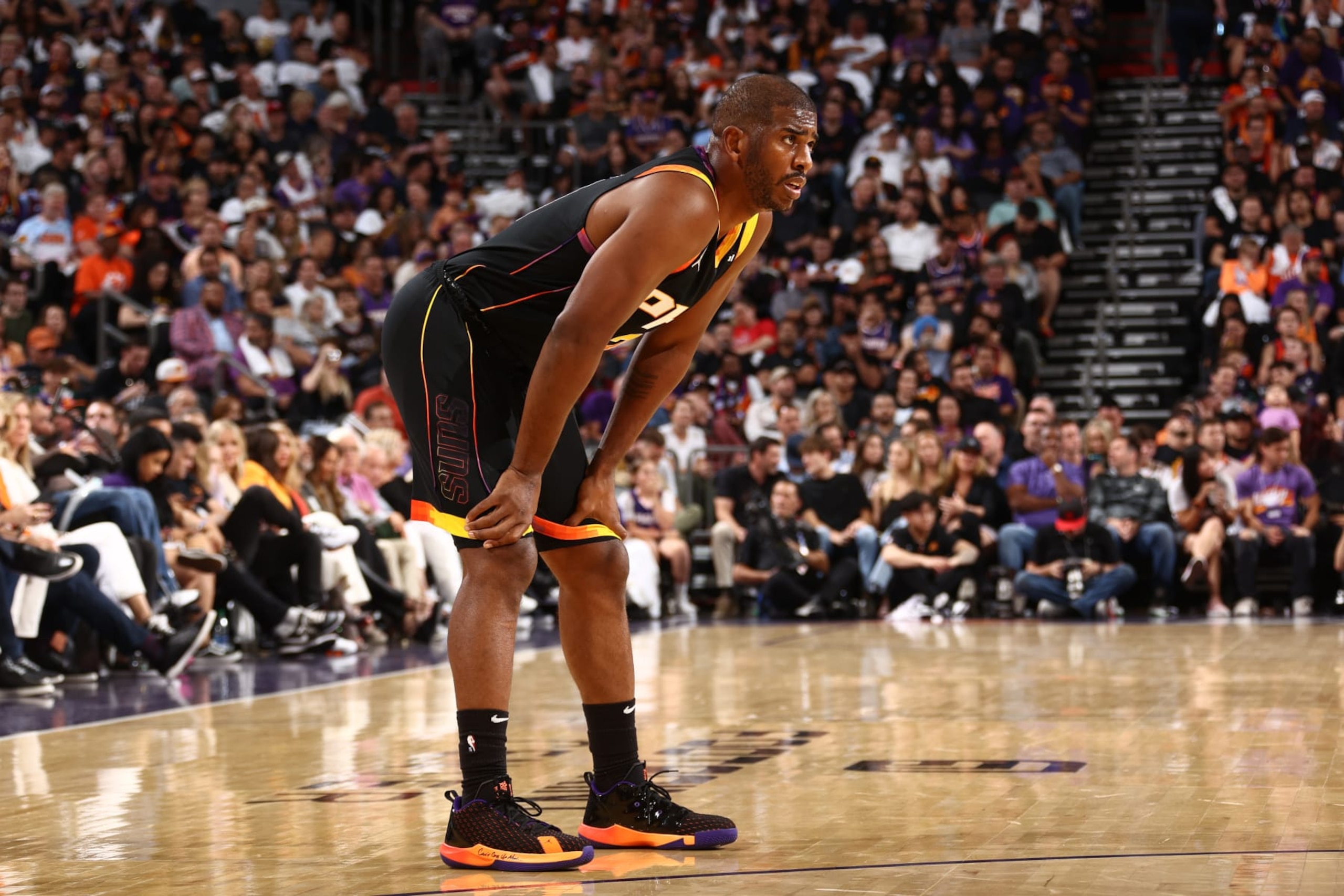 PHOENIX, AZ - OCTOBER 19: Chris Paul #3 of the Phoenix Suns looks on during the game against the Dallas Mavericks on October 19, 2022 at Footprint Center in Phoenix, Arizona. NOTE TO USER: User expressly acknowledges and agrees that, by downloading and or using this photograph, user is consenting to the terms and conditions of the Getty Images License Agreement. Mandatory Copyright Notice: Copyright 2022 NBAE (Photo by Ned Dishman/NBAE via Getty Images)
