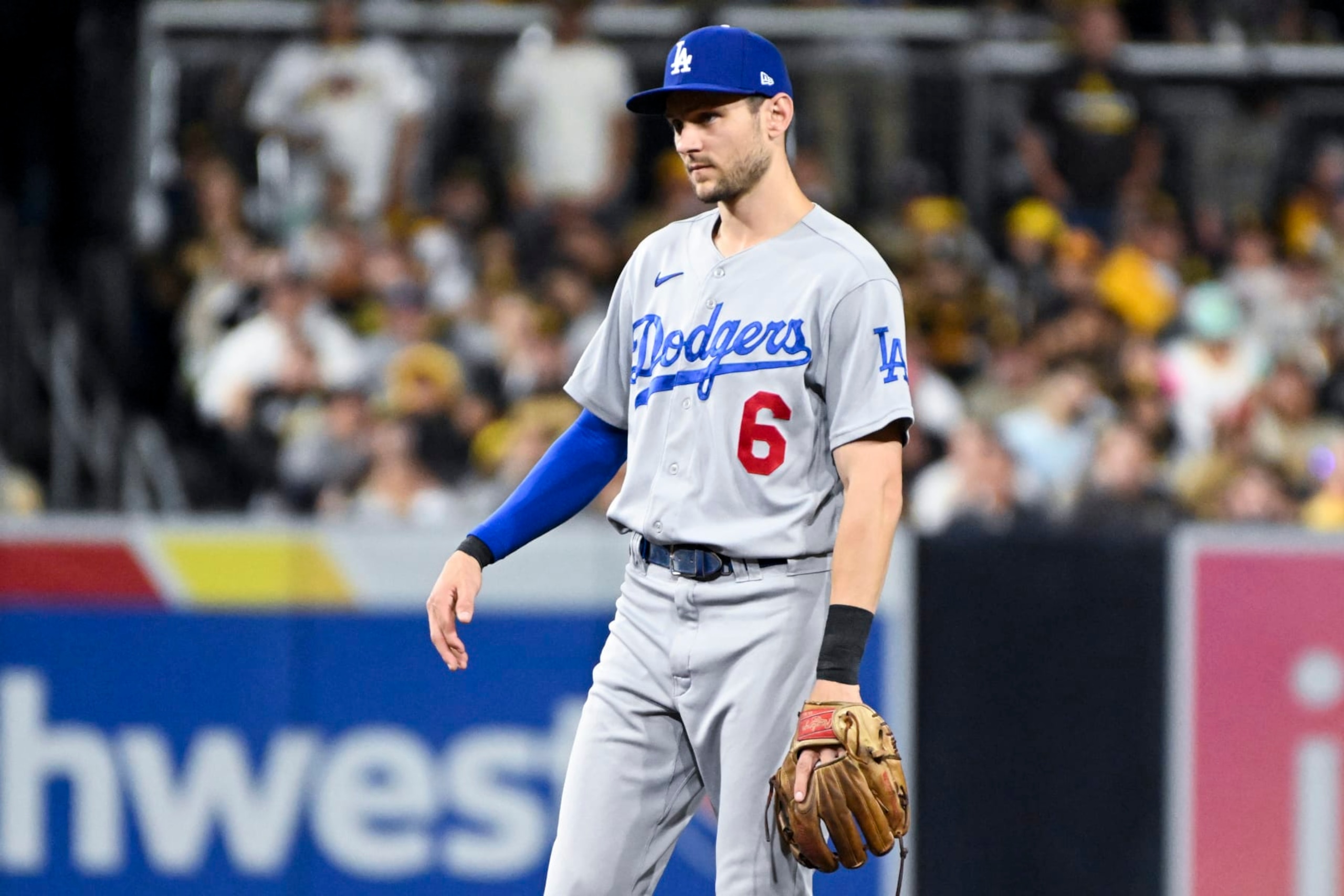 San Diego, CA - October 15: Los Angeles Dodgers Trea Turner shakes his hand while standing near second base during the second inning against the San Diego Padres in game 4 of the NLDS at Petco Park on Saturday, Oct. 15, 2022 in San Diego, CA. (Wally Skalij / Los Angeles Times via Getty Images)