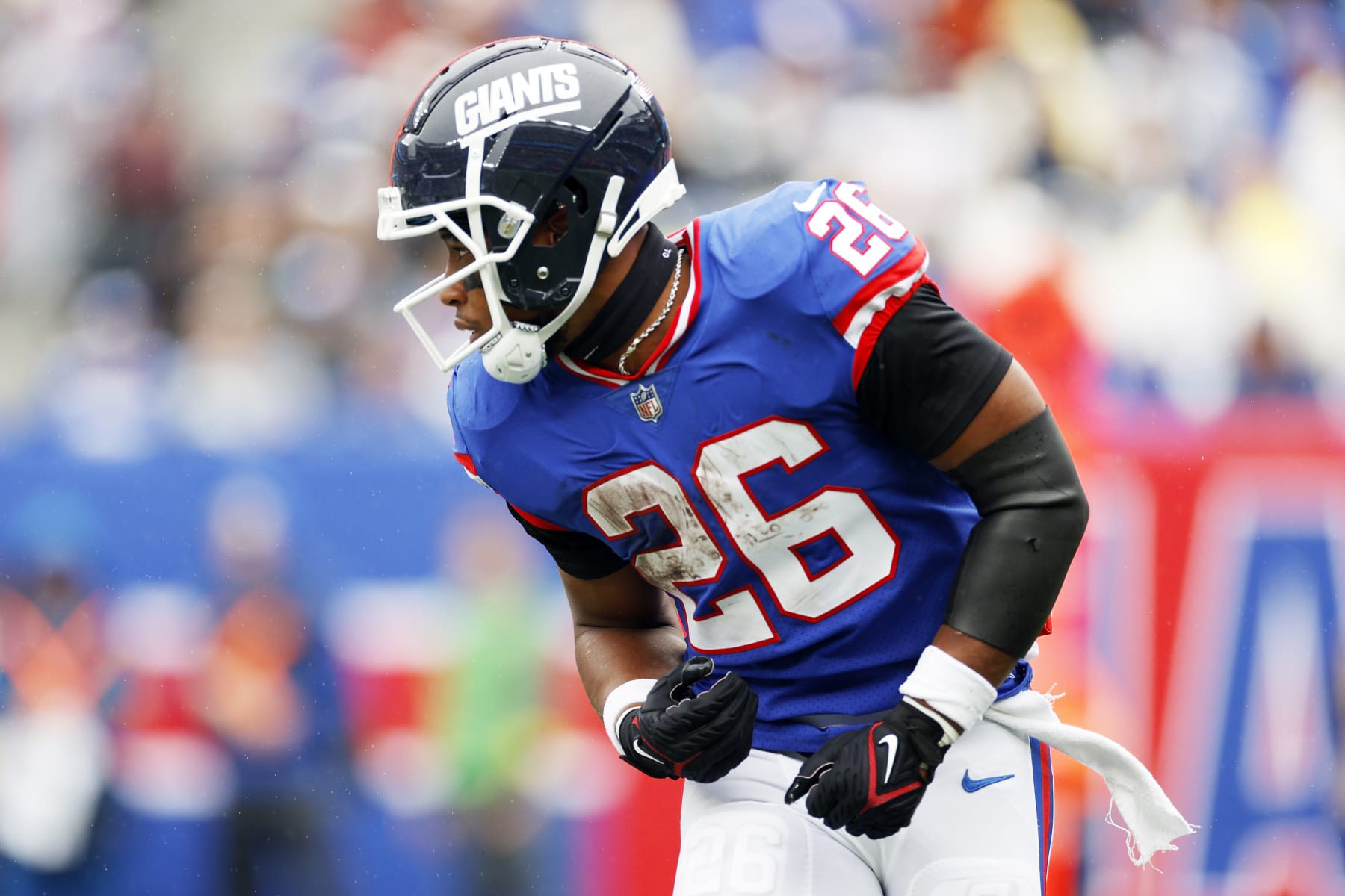 EAST RUTHERFORD, NEW JERSEY - OCTOBER 02: Saquon Barkley #26 of the New York Giants looks on during the game against the Chicago Bears at MetLife Stadium on October 02, 2022 in East Rutherford, New Jersey. (Photo by Sarah Stier/Getty Images)