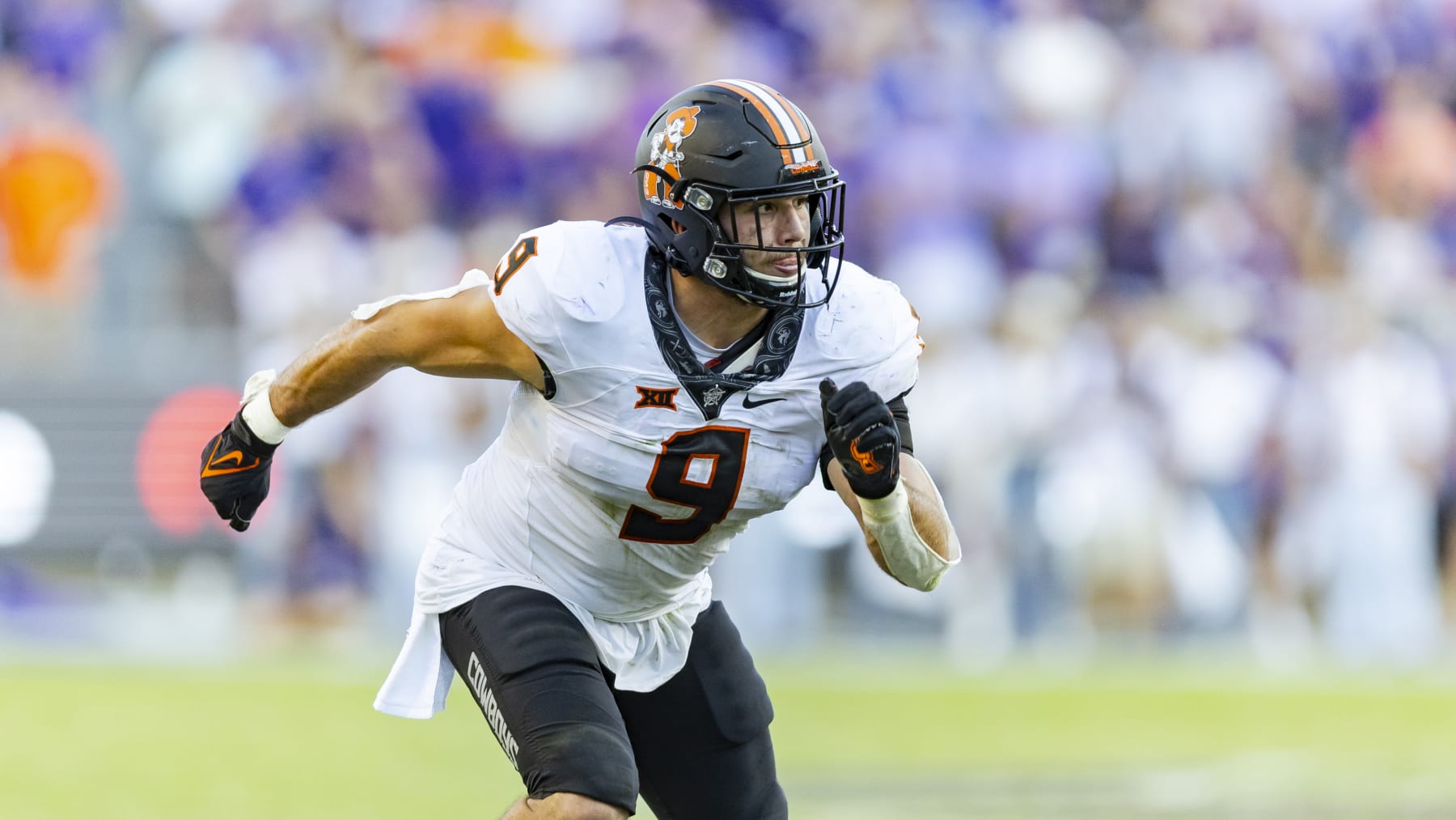Oklahoma State defensive end Brock Martin (9) is seen during an NCAA football game against TCU on Saturday, Oct. 15, 2022, in Fort Worth, Texas. TCU won 43-40 in double overtime. (AP Photo/Brandon Wade)