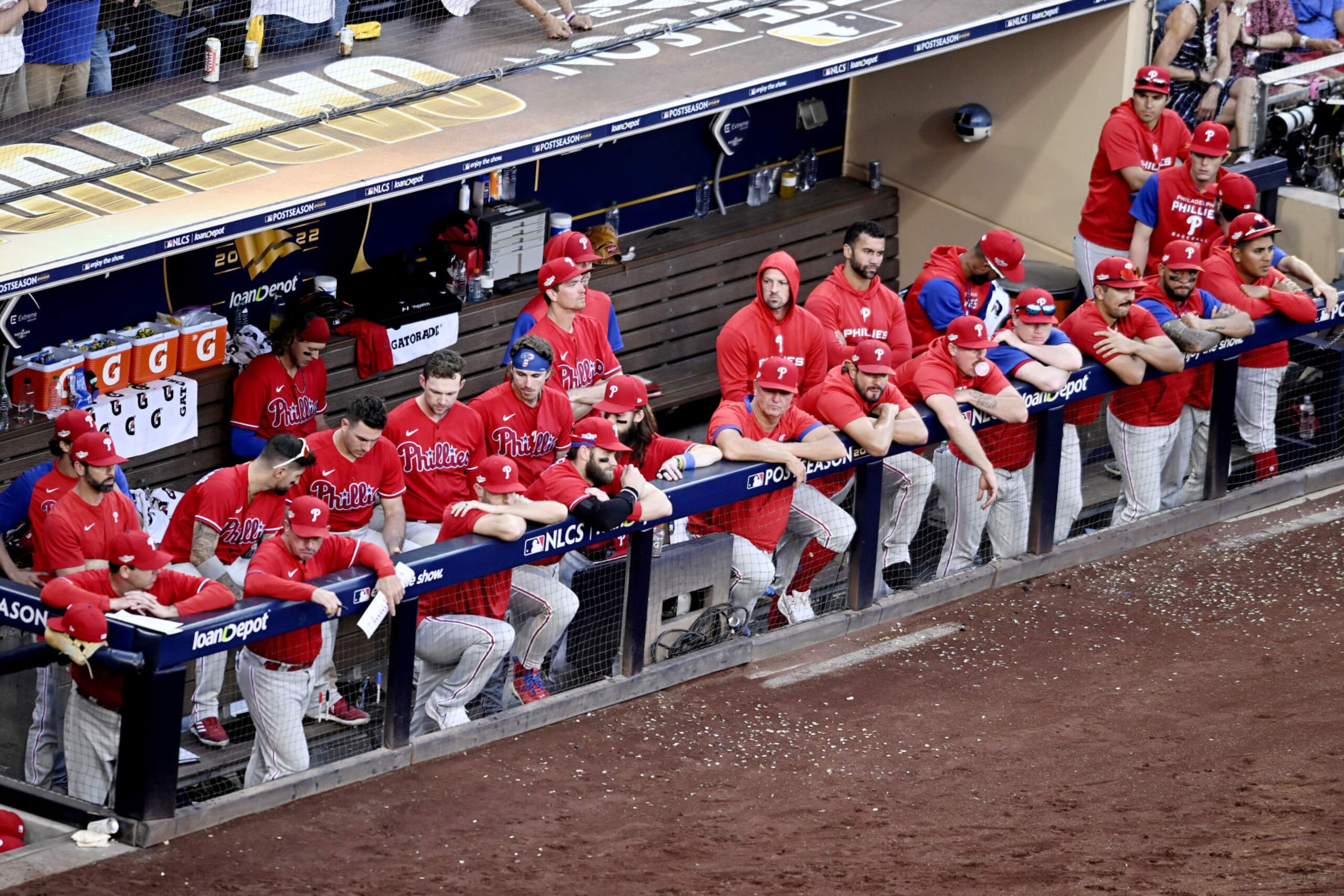 SAN DIEGO, CALIFORNIA - OCTOBER 19: The Philadelphia Phillies dugout looks on during the ninth inning against the San Diego Padres in game two of the National League Championship Series at PETCO Park on October 19, 2022 in San Diego, California. (Photo by Denis Poroy/Getty Images)