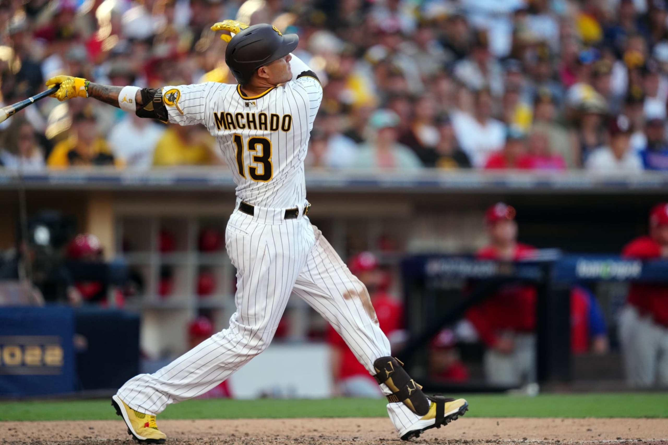 SAN DIEGO, CA - OCTOBER 19: Manny Machado #13 of the San Diego Padres hits a solo home run in the seventh inning of Game 2 of the NLCS between the Philadelphia Phillies and the San Diego Padres at Petco Park on Wednesday, October 19, 2022 in San Diego, California. (Photo by Daniel Shirey/MLB Photos via Getty Images)