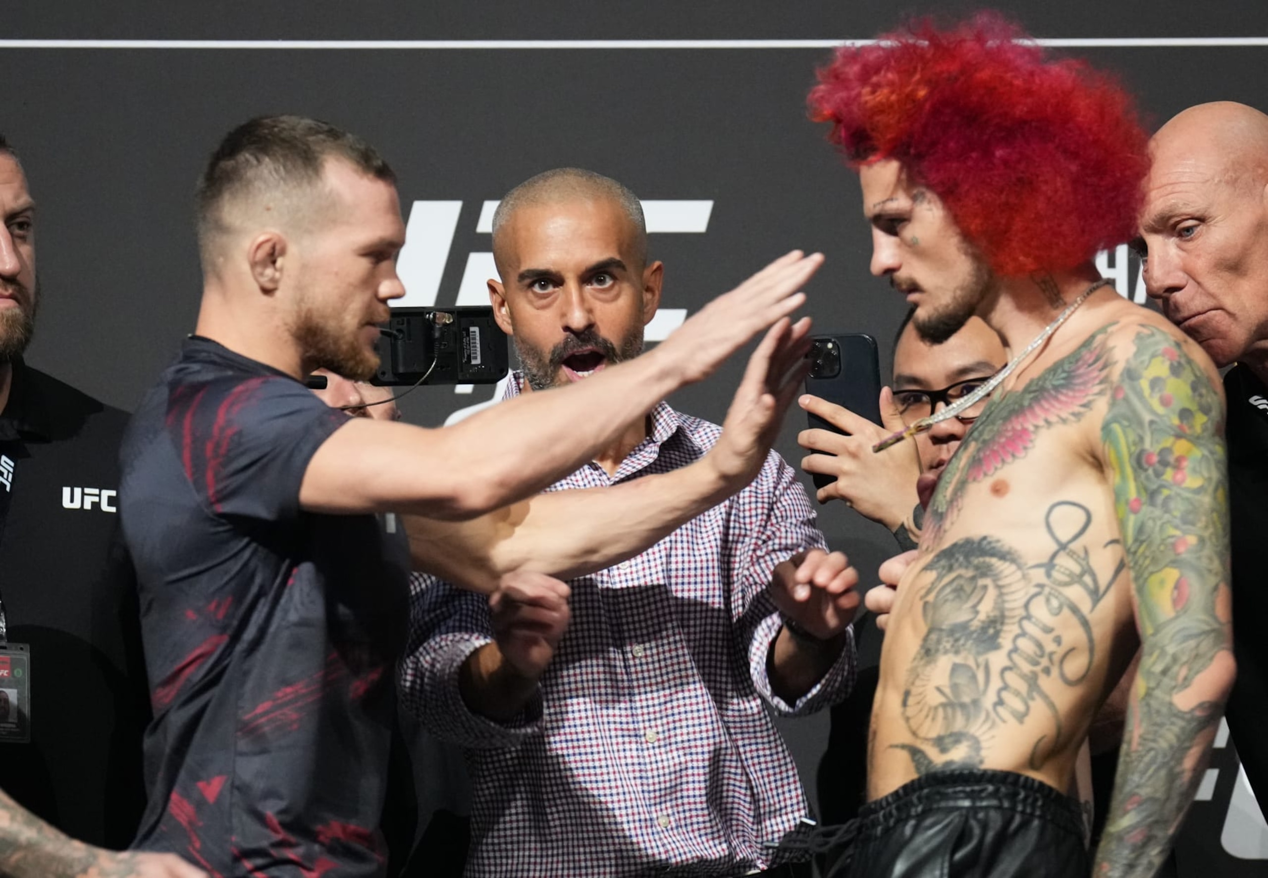 ABU DHABI, UNITED ARAB EMIRATES - OCTOBER 20: (L-R) Opponents Petr Yan of Russia and Sean O'Malley face off during the UFC 280 press conference at Etihad Arena on October 20, 2022 in Abu Dhabi, United Arab Emirates. (Photo by Chris Unger/Zuffa LLC)