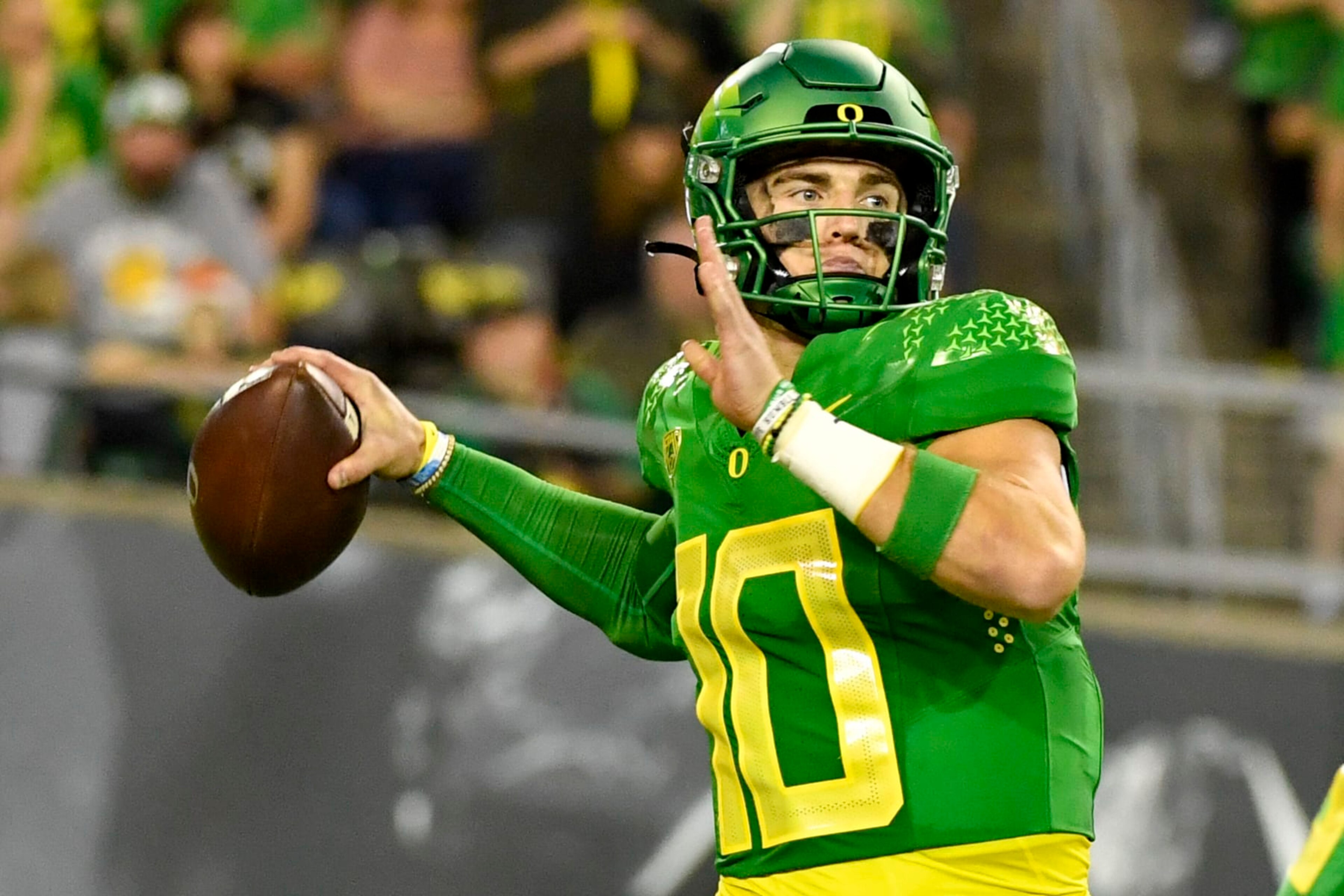 Oregon quarterback Bo Nix (10) passes against Stanford during the first half of an NCAA college football game Saturday, Oct. 1, 2022, in Eugene, Ore. (AP Photo/Andy Nelson)