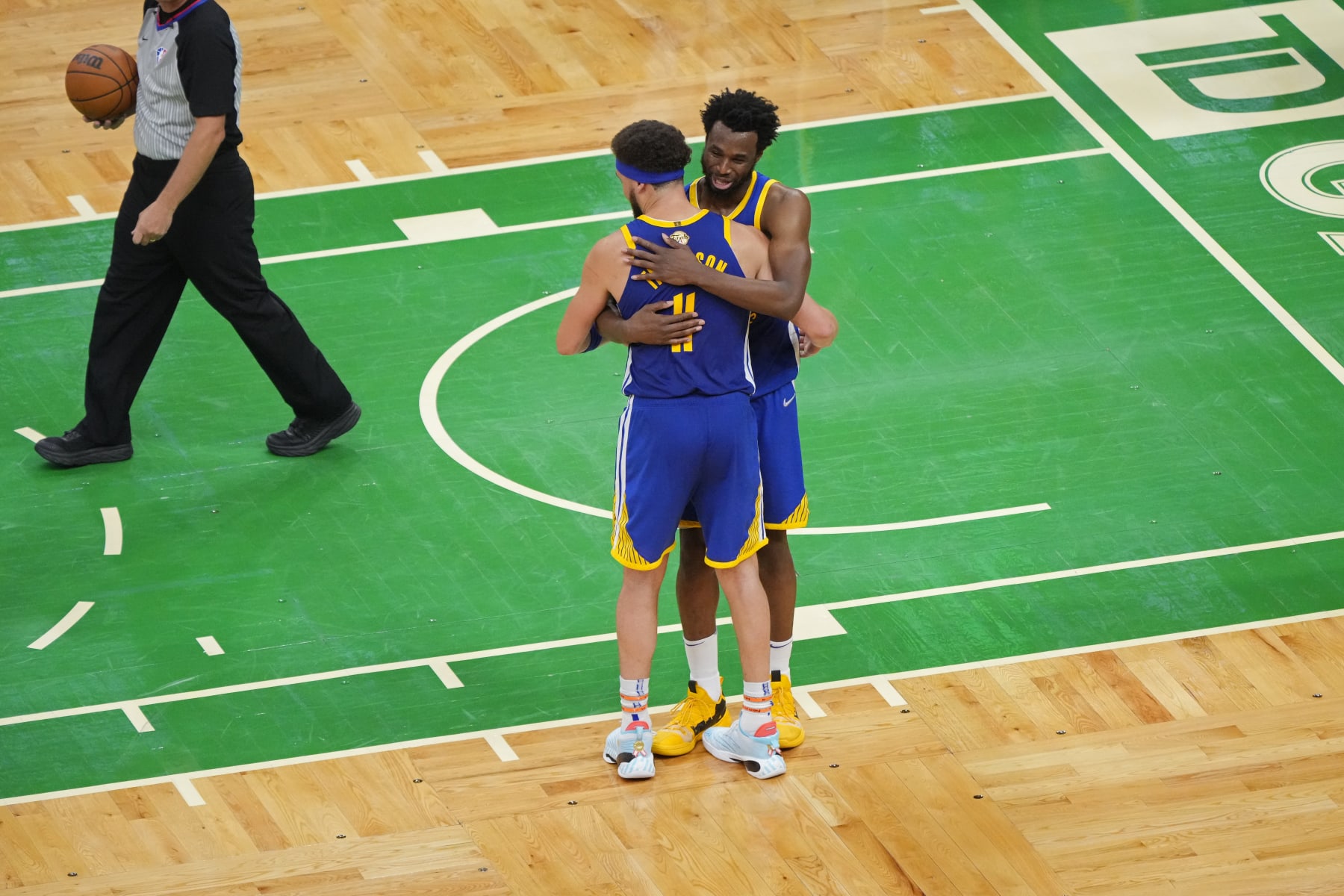 BOSTON, MA - JUNE 16: Klay Thompson #11 and Andrew Wiggins #22 of the Golden State Warriors celebrate on court after winning Game Six of the 2022 NBA Finals against the Boston Celtics on June 16, 2022 at TD Garden in Boston, Massachusetts. NOTE TO USER: User expressly acknowledges and agrees that, by downloading and or using this photograph, user is consenting to the terms and conditions of Getty Images License Agreement. Mandatory Copyright Notice: Copyright 2022 NBAE (Photo by Mark Blinch/NBAE via Getty Images)