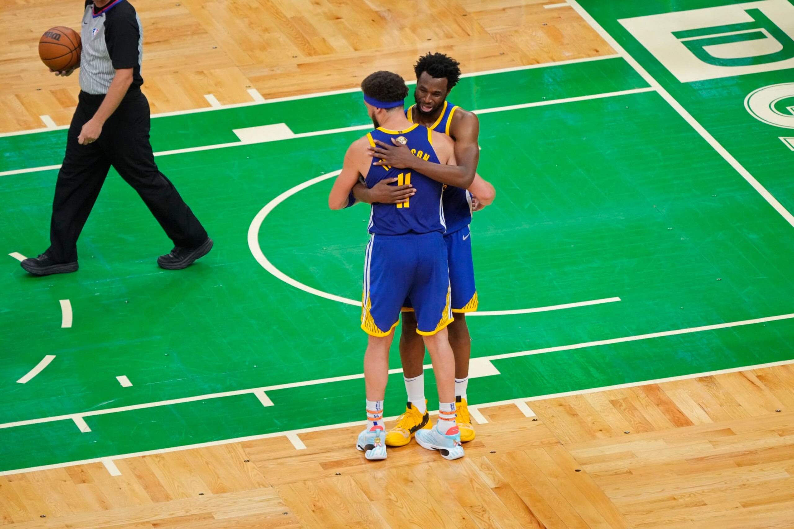 BOSTON, MA - JUNE 16: Klay Thompson #11 and Andrew Wiggins #22 of the Golden State Warriors celebrate on court after winning Game Six of the 2022 NBA Finals against the Boston Celtics on June 16, 2022 at TD Garden in Boston, Massachusetts. NOTE TO USER: User expressly acknowledges and agrees that, by downloading and or using this photograph, user is consenting to the terms and conditions of Getty Images License Agreement. Mandatory Copyright Notice: Copyright 2022 NBAE (Photo by Mark Blinch/NBAE via Getty Images)