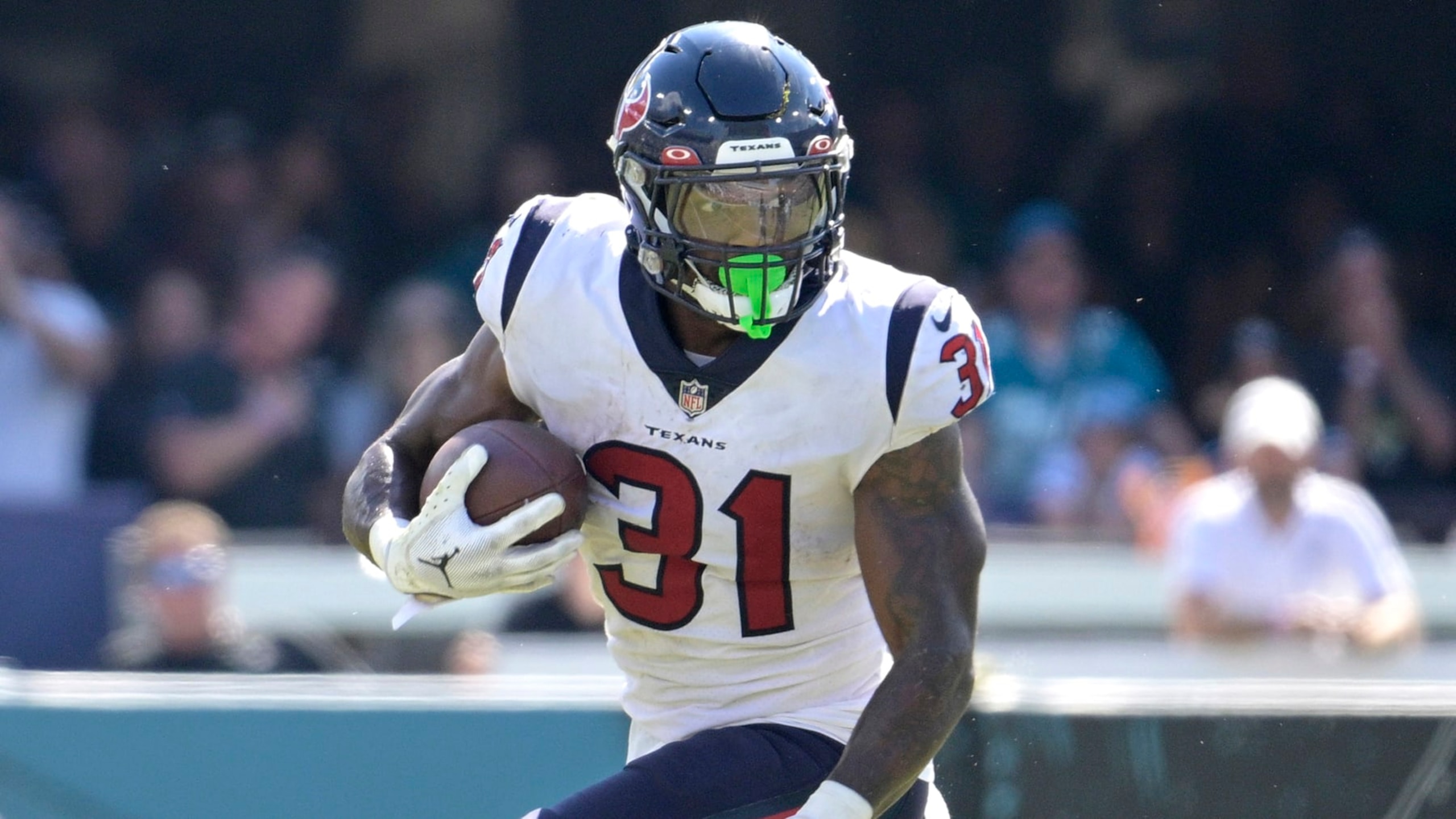 Houston Texans running back Dameon Pierce (31) rushes for yardage during the second half of an NFL football game against the Jacksonville Jaguars, Sunday, Oct. 9, 2022, in Jacksonville, Fla. (AP Photo/Phelan M. Ebenhack)