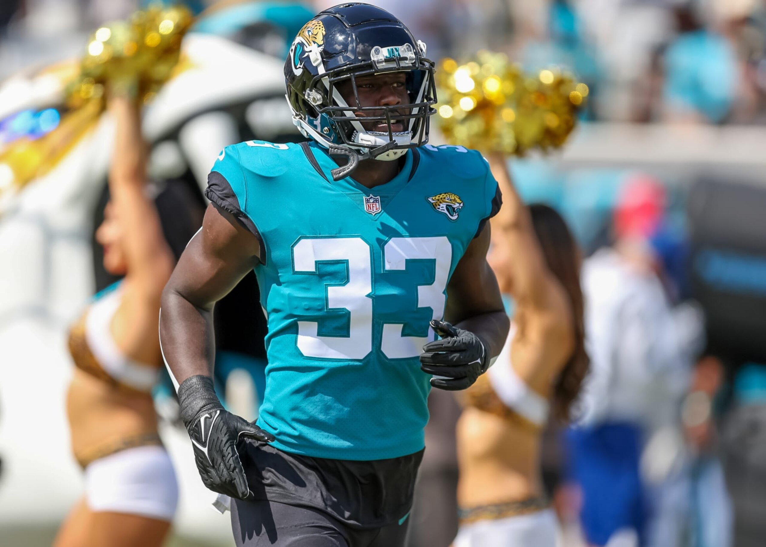JACKSONVILLE, FLORIDA - OCTOBER 9: Devin Lloyd #33 of the Jacksonville Jaguars is introduced prior to a game against the Houston Texans at TIAA Bank Field on October 9, 2022 in Jacksonville, Florida. (Photo by Mike Carlson/Getty Images)