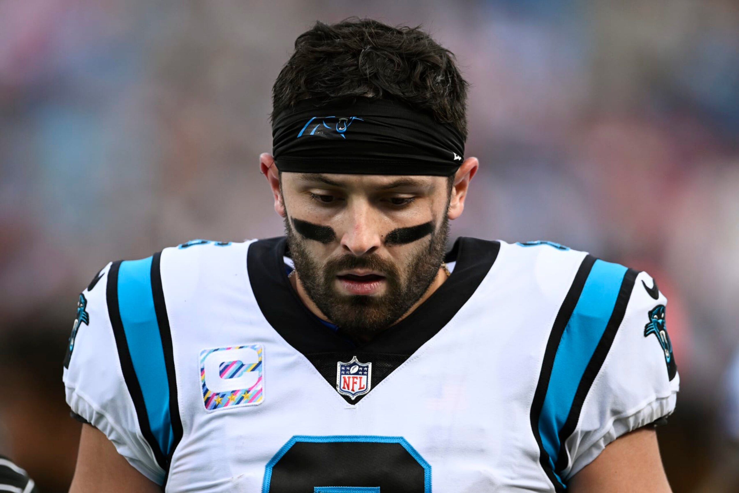 CHARLOTTE, NORTH CAROLINA - OCTOBER 09: Baker Mayfield #6 of the Carolina Panthers walks off the field at halftime against the San Francisco 49ers at Bank of America Stadium on October 09, 2022 in Charlotte, North Carolina. (Photo by Eakin Howard/Getty Images)