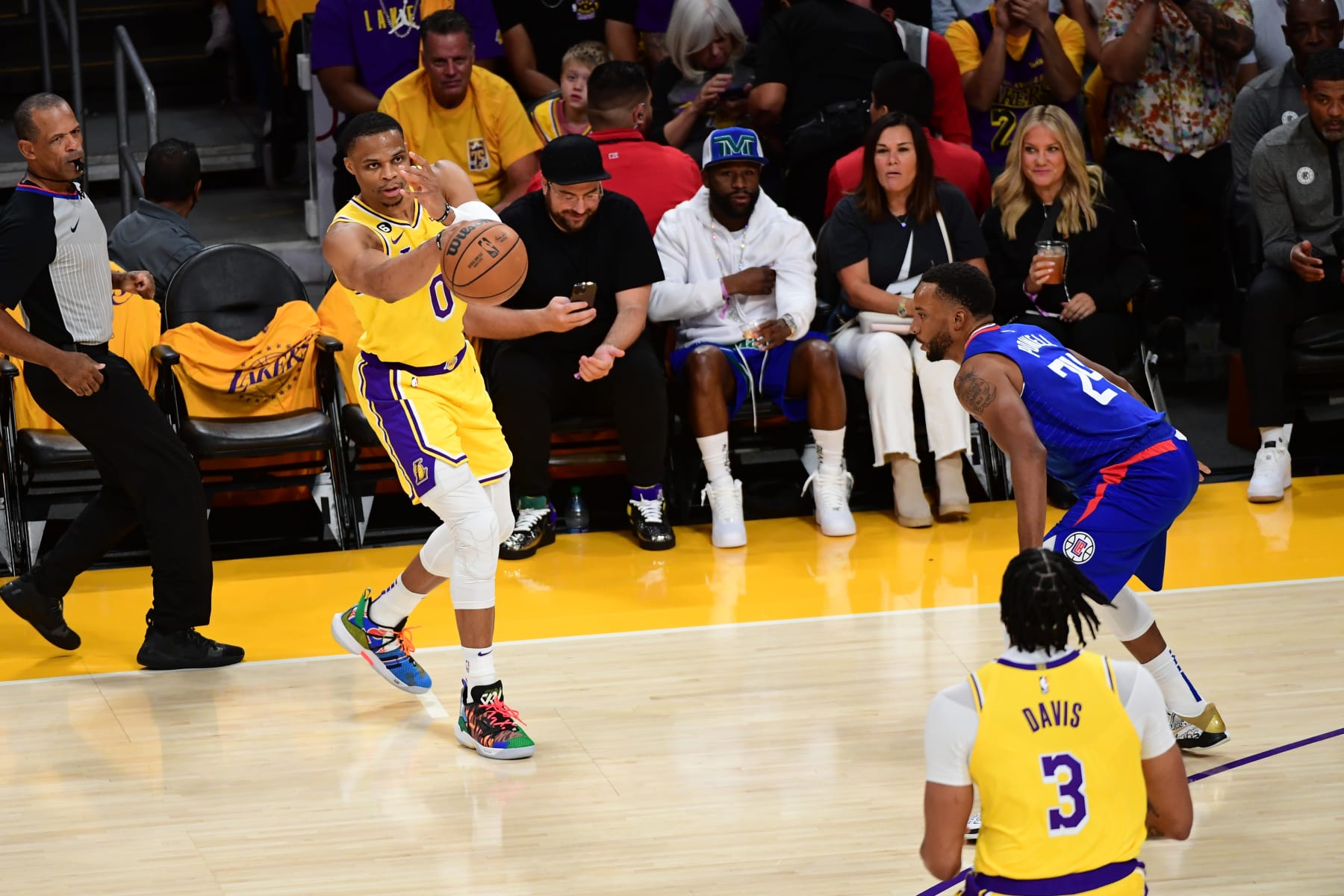 LOS ANGELES, CA - OCTOBER 20: Russell Westbrook #0 of the Los Angeles Lakers passes the ball during the game against the LA Clippers on October 20, 2022 at Crypto.Com Arena in Los Angeles, California. NOTE TO USER: User expressly acknowledges and agrees that, by downloading and/or using this Photograph, user is consenting to the terms and conditions of the Getty Images License Agreement. Mandatory Copyright Notice: Copyright 2022 NBAE (Photo by Adam Pantozzi/NBAE via Getty Images)
