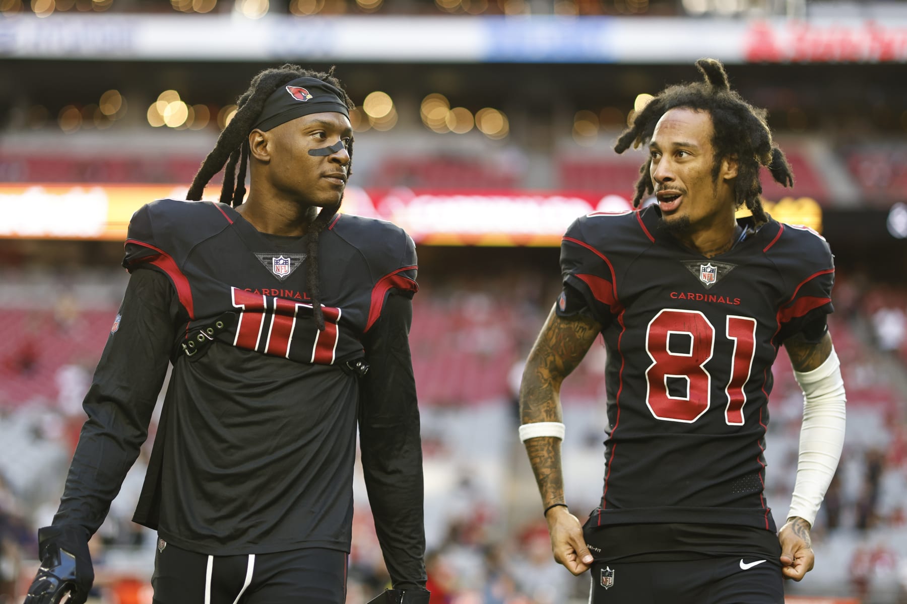 GLENDALE, ARIZONA - OCTOBER 20: DeAndre Hopkins #10 and Robbie Anderson #81 of the Arizona Cardinals warm up prior to a game against the New Orleans Saints at State Farm Stadium on October 20, 2022 in Glendale, Arizona. (Photo by Michael Owens/Getty Images)