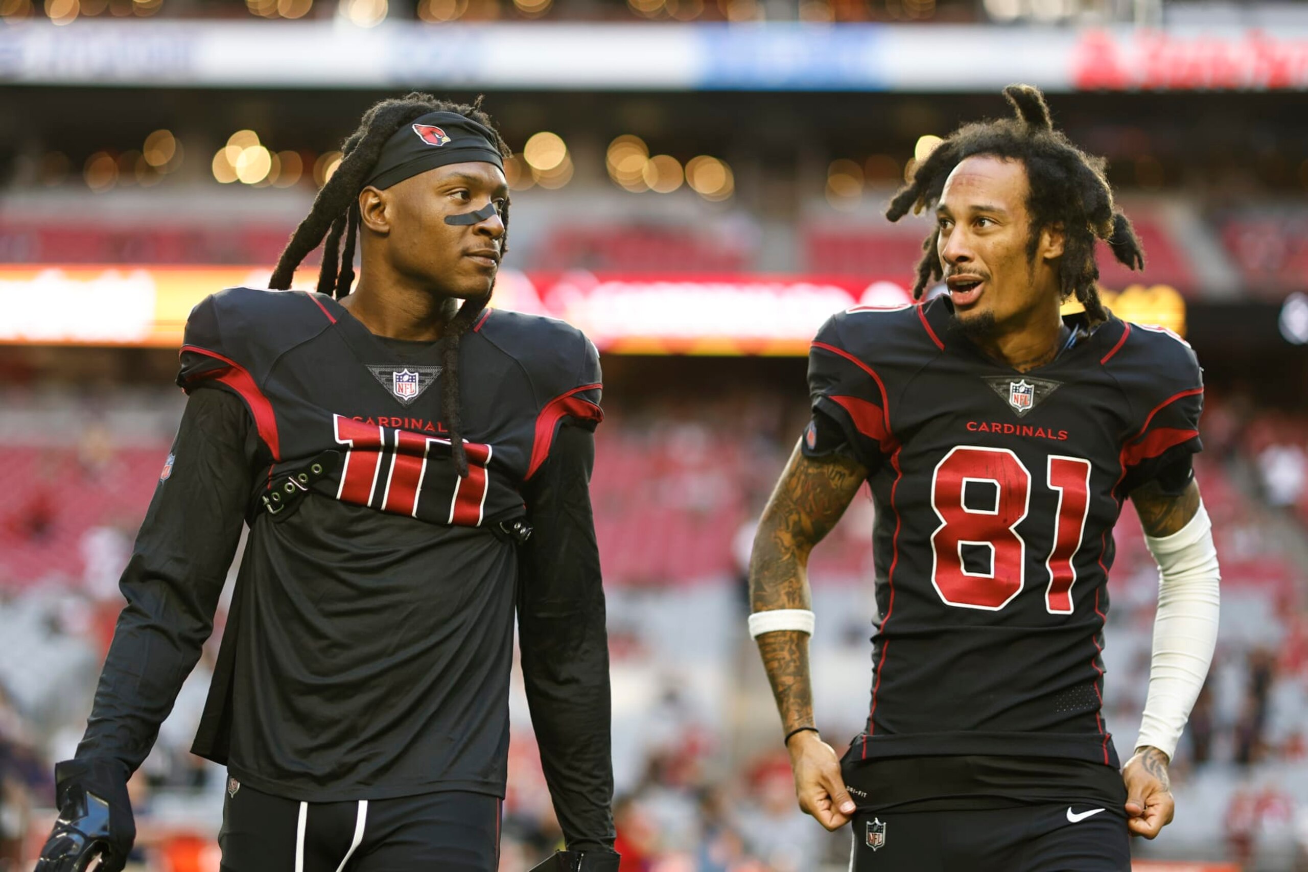 GLENDALE, ARIZONA - OCTOBER 20: DeAndre Hopkins #10 and Robbie Anderson #81 of the Arizona Cardinals warm up prior to a game against the New Orleans Saints at State Farm Stadium on October 20, 2022 in Glendale, Arizona. (Photo by Michael Owens/Getty Images)
