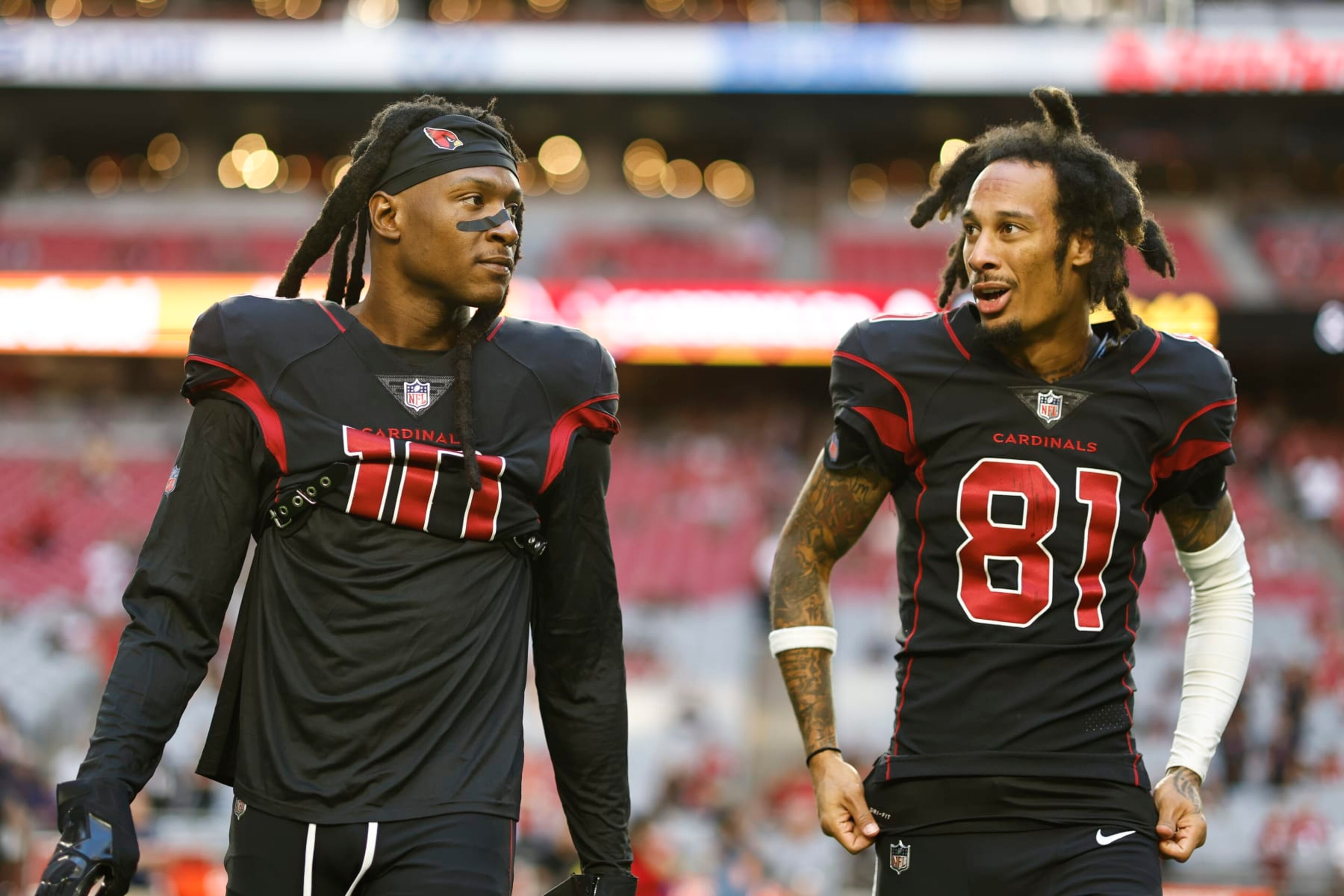 GLENDALE, ARIZONA - OCTOBER 20: DeAndre Hopkins #10 and Robbie Anderson #81 of the Arizona Cardinals warm up prior to a game against the New Orleans Saints at State Farm Stadium on October 20, 2022 in Glendale, Arizona. (Photo by Michael Owens/Getty Images)
