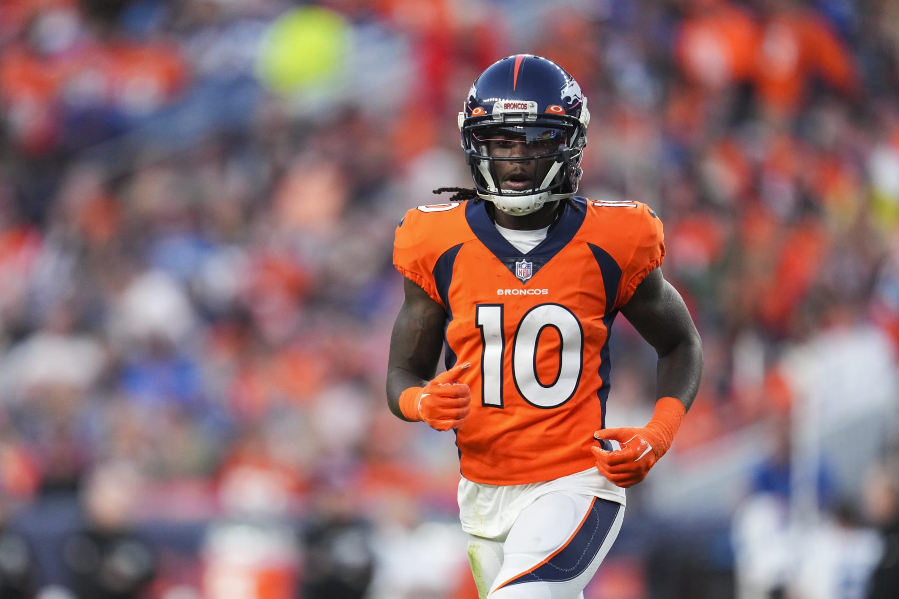 DENVER, CO - OCTOBER 06: Jerry Jeudy #10 of the Denver Broncos gets set against the Indianapolis Colts at Empower Field at Mile High on October 6, 2022 in Denver, Texas. (Photo by Cooper Neill/Getty Images)