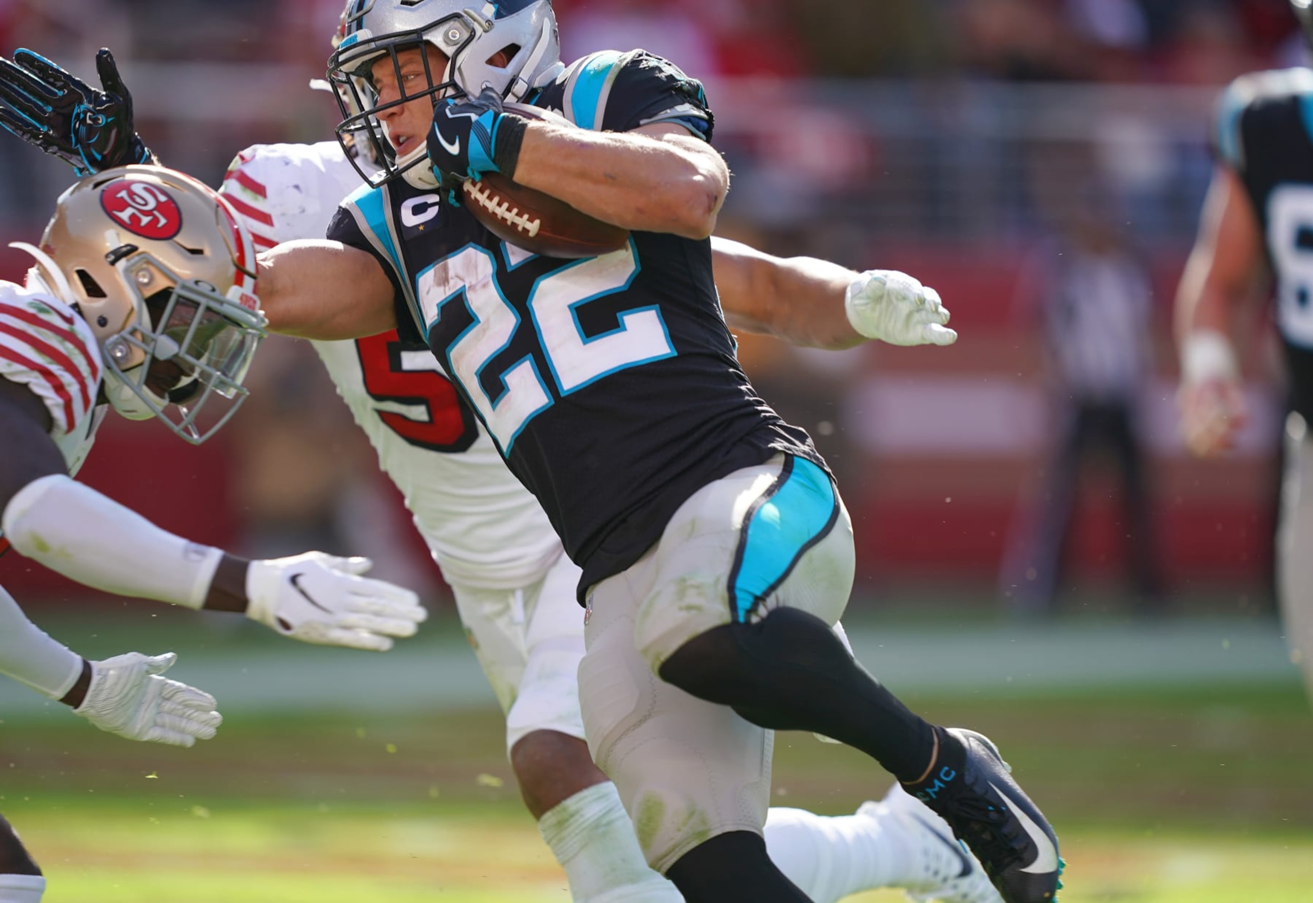 SANTA CLARA, CALIFORNIA - OCTOBER 27: Christian McCaffrey #22 of the Carolina Panthers carries the ball in for a two-point conversion against the San Francisco 49ers during the third quarter of an NFL football game at Levi's Stadium on October 27, 2019 in Santa Clara, California. (Photo by Thearon W. Henderson/Getty Images)