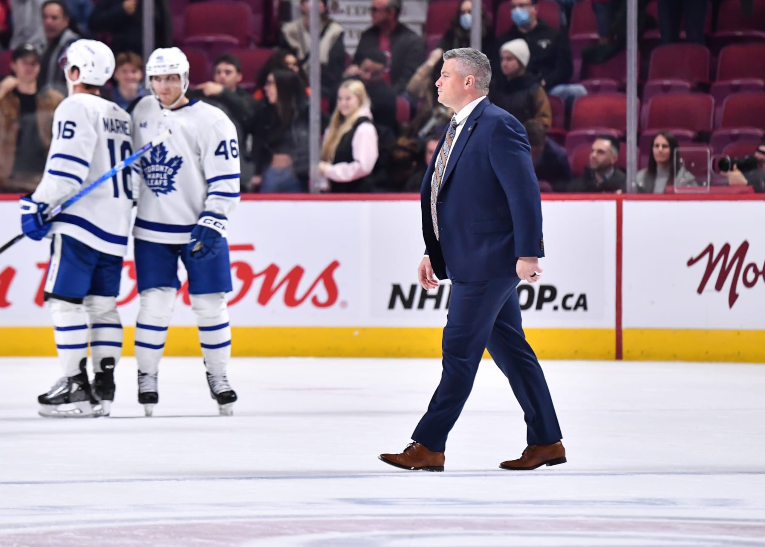 MONTREAL, CANADA - OCTOBER 03:  Head coach of the Toronto Maple Leafs, Sheldon Keefe, walks across the ice after a victory against the Montreal Canadiens in a preseason game at Centre Bell on October 3, 2022 in Montreal, Quebec, Canada.  The Toronto Maple Leafs defeated the Montreal Canadiens 5-1.  (Photo by Minas Panagiotakis/Getty Images)
