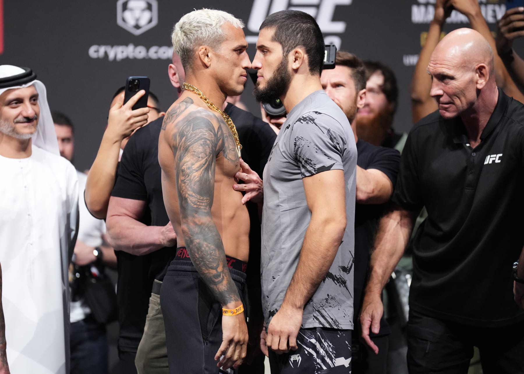 ABU DHABI, UNITED ARAB EMIRATES - OCTOBER 21: (L-R) Opponents Charles Oliveira of Brazil and Islam Makhachev of Russia face off during the UFC 280 ceremonial weigh-in at Etihad Arena on October 21, 2022 in Abu Dhabi, United Arab Emirates. (Photo by Chris Unger/Zuffa LLC)