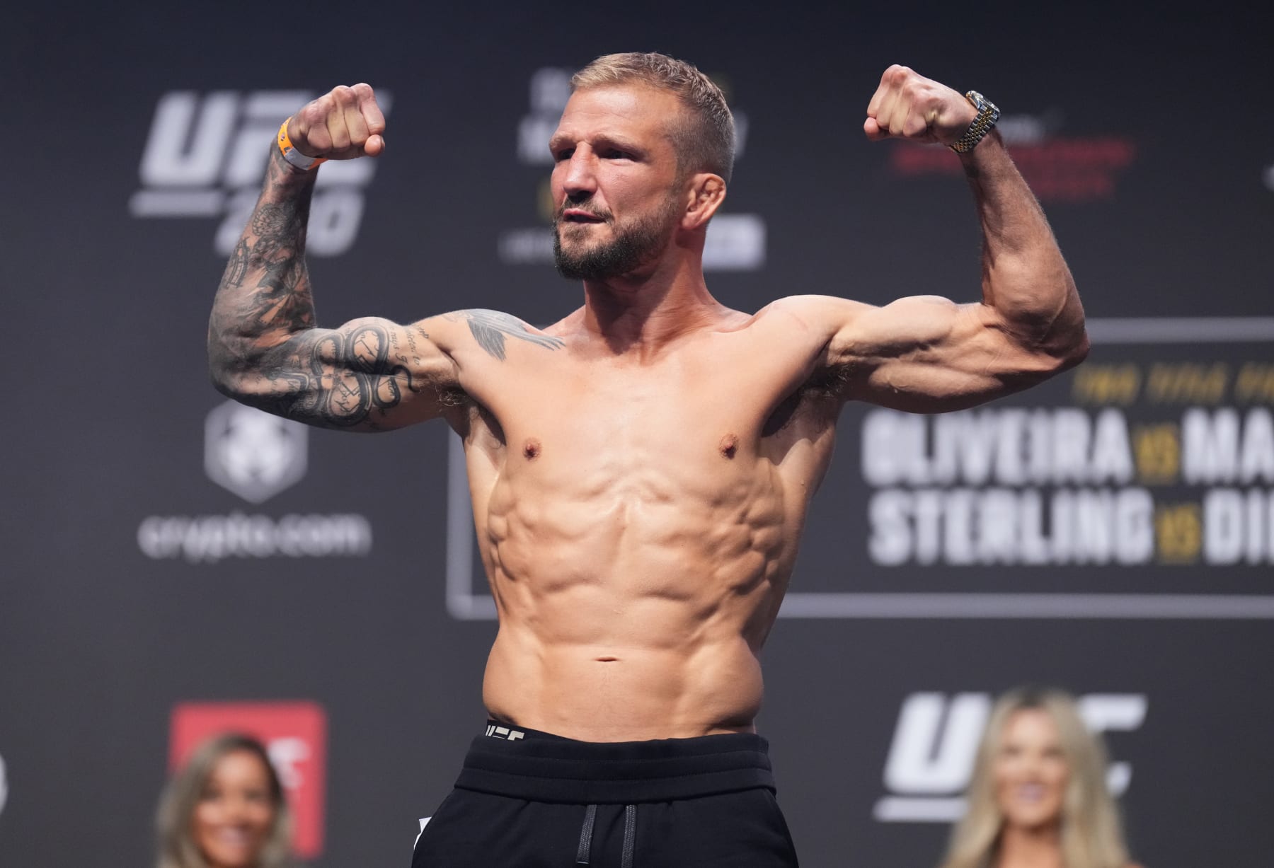 ABU DHABI, UNITED ARAB EMIRATES - OCTOBER 21: TJ Dillashaw poses on the scale during the UFC 280 ceremonial weigh-in at Etihad Arena on October 21, 2022 in Abu Dhabi, United Arab Emirates. (Photo by Chris Unger/Zuffa LLC)