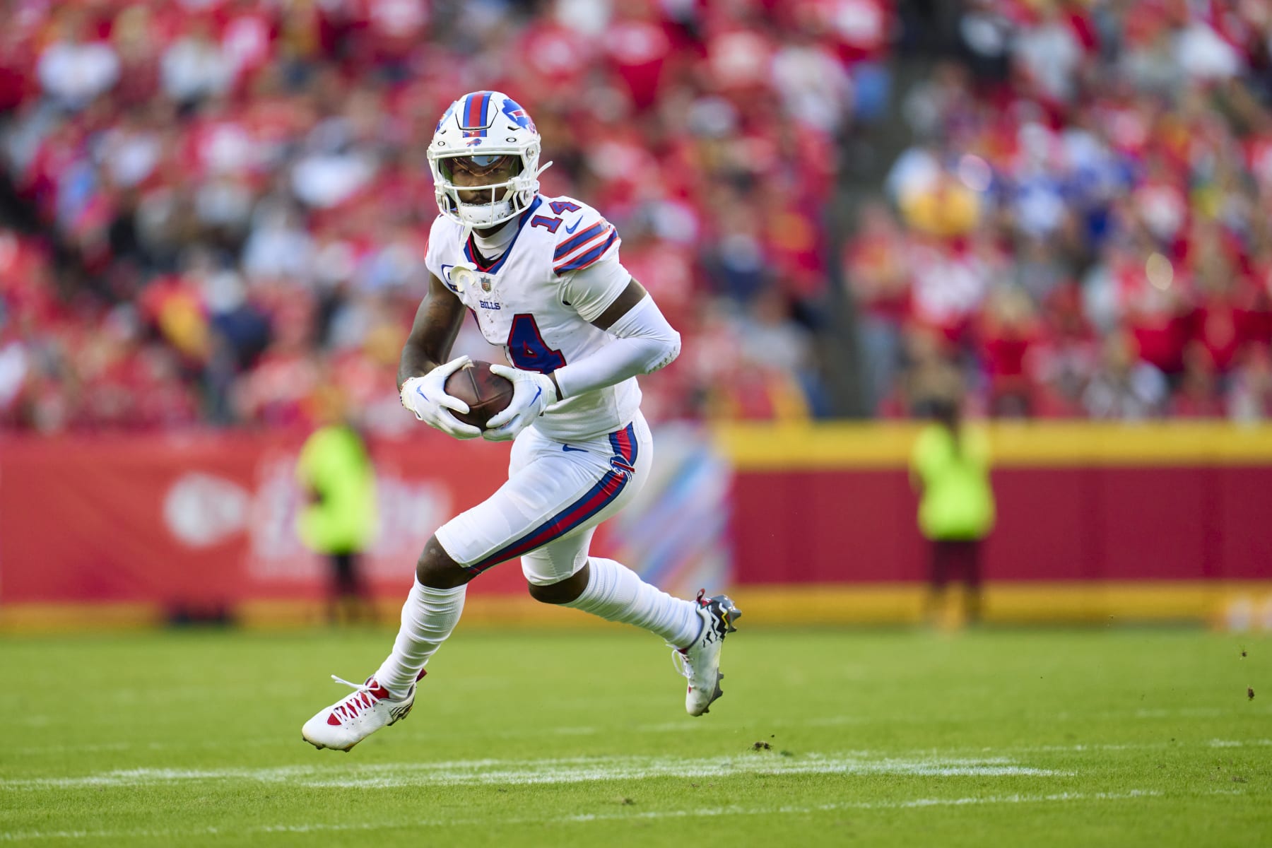 KANSAS CITY, MO - OCTOBER 16: Stefon Diggs #14 of the Buffalo Bills runs with the ball after a catch against the Kansas City Chiefs during the second half at GEHA Field at Arrowhead Stadium on October 16, 2022 in Kansas City, Missouri. (Photo by Cooper Neill/Getty Images)