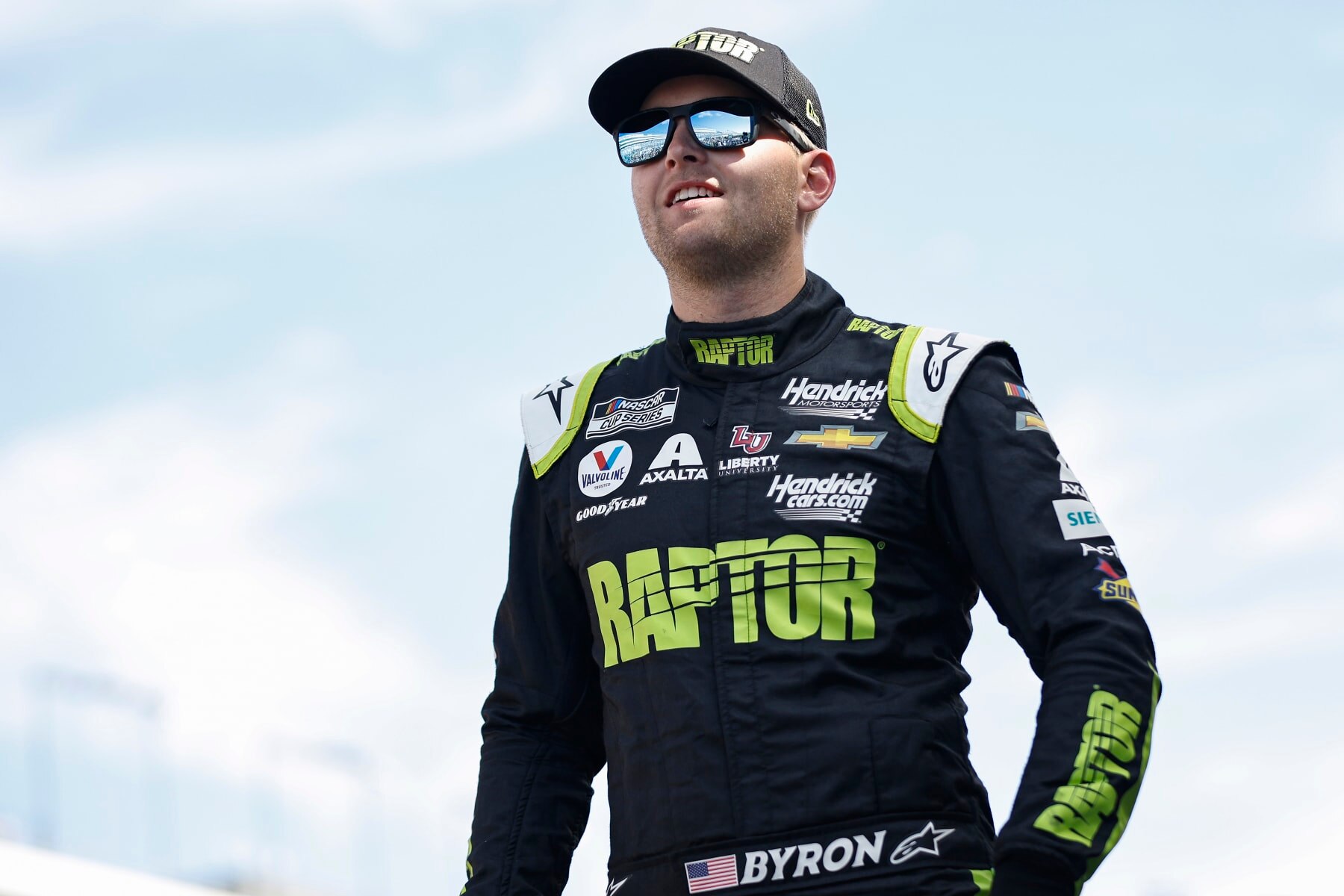 LAS VEGAS, NEVADA - OCTOBER 16: William Byron, driver of the #24 RaptorTough.com Chevrolet, walks onstage during driver intros prior to the NASCAR Cup Series South Point 400 at Las Vegas Motor Speedway on October 16, 2022 in Las Vegas, Nevada. (Photo by Sean Gardner/Getty Images)