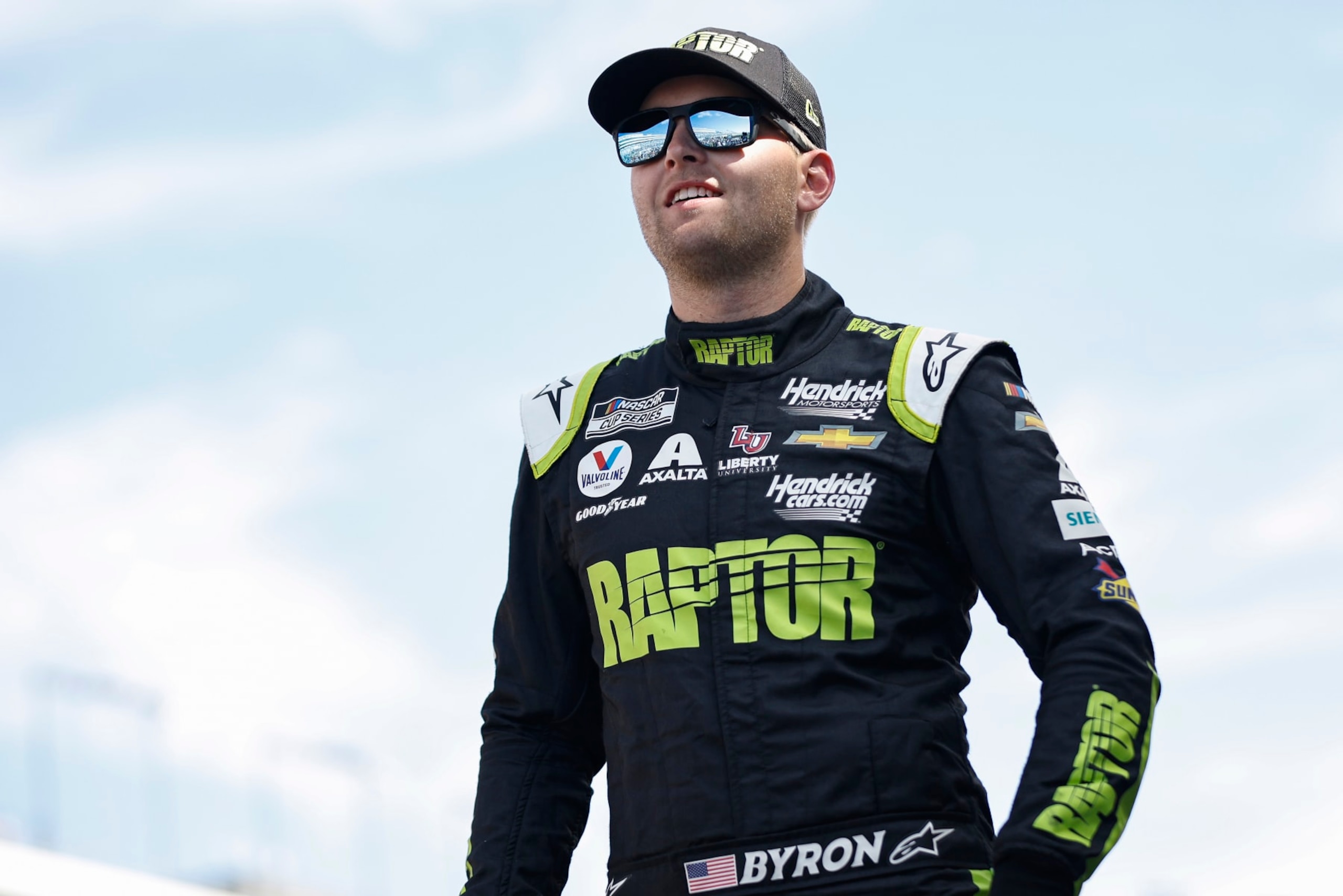 LAS VEGAS, NEVADA - OCTOBER 16: William Byron, driver of the #24 RaptorTough.com Chevrolet, walks onstage during driver intros prior to the NASCAR Cup Series South Point 400 at Las Vegas Motor Speedway on October 16, 2022 in Las Vegas, Nevada. (Photo by Sean Gardner/Getty Images)