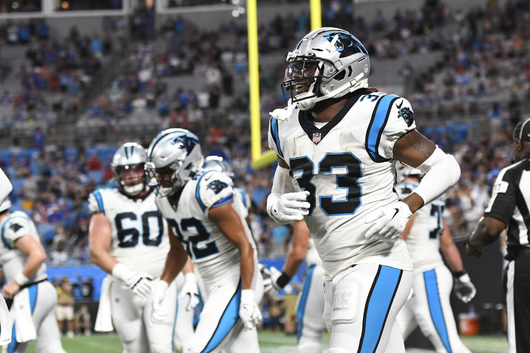 CHARLOTTE, NORTH CAROLINA - AUGUST 26: D'Onta Foreman #33 of the Carolina Panthers celebrates scoring a first quarter touchdown against the Buffalo Bills during a preseason game at Bank of America Stadium on August 26, 2022 in Charlotte, North Carolina. (Photo by Eakin Howard/Getty Images)