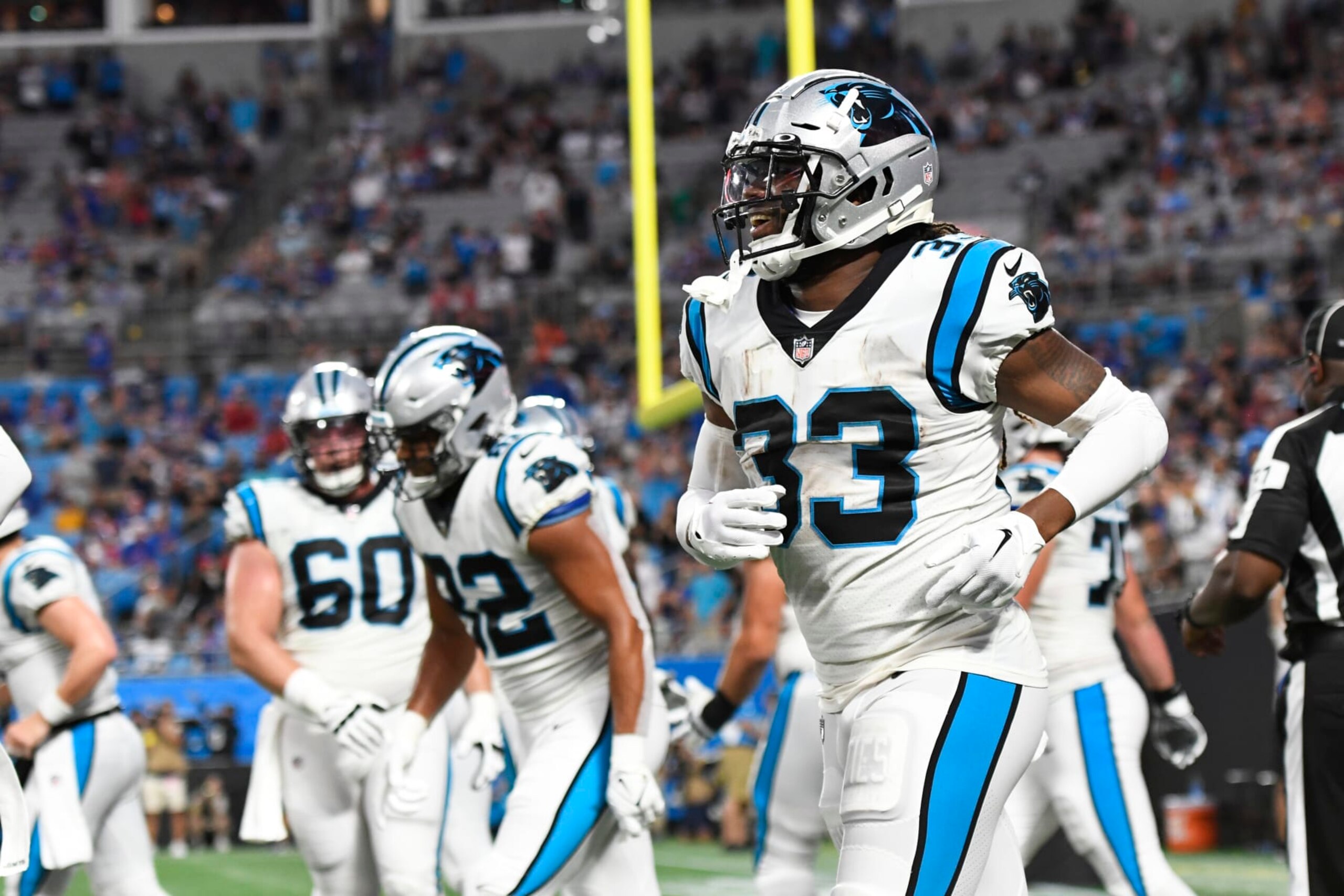 CHARLOTTE, NORTH CAROLINA - AUGUST 26: D'Onta Foreman #33 of the Carolina Panthers celebrates scoring a first quarter touchdown against the Buffalo Bills during a preseason game at Bank of America Stadium on August 26, 2022 in Charlotte, North Carolina. (Photo by Eakin Howard/Getty Images)