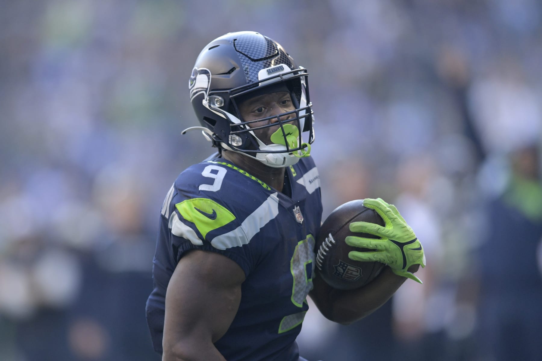 Seattle Seahawks running back Kenneth Walker III (9) runs for a touchdown against the Arizona Cardinals during the second half of an NFL football game in Seattle, Sunday, Oct. 16, 2022. (AP Photo/Caean Couto)