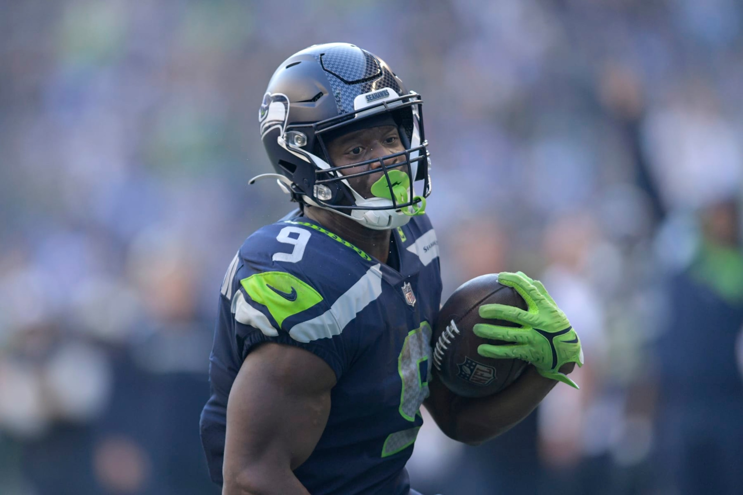 Seattle Seahawks running back Kenneth Walker III (9) runs for a touchdown against the Arizona Cardinals during the second half of an NFL football game in Seattle, Sunday, Oct. 16, 2022. (AP Photo/Caean Couto)