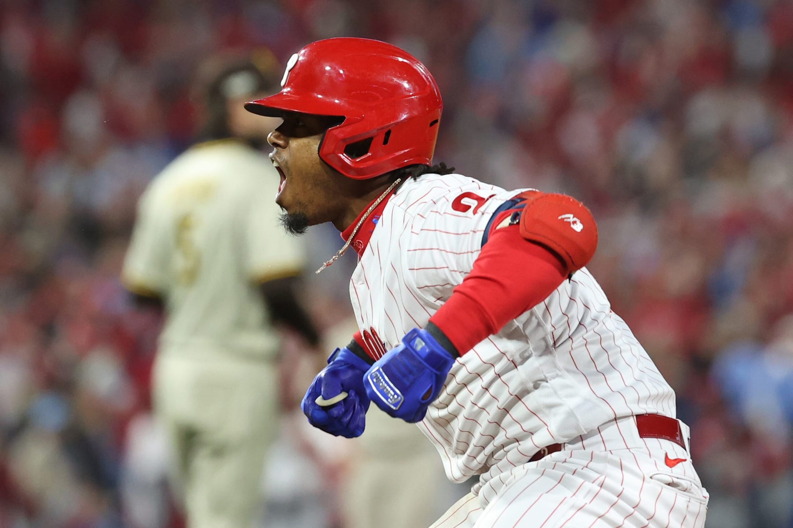 PHILADELPHIA, PENNSYLVANIA - OCTOBER 21: Jean Segura #2 of the Philadelphia Phillies celebrates after hitting a two-run RBI single during the fourth inning against the San Diego Padres in game three of the National League Championship Series at Citizens Bank Park on October 21, 2022 in Philadelphia, Pennsylvania. (Photo by Tim Nwachukwu/Getty Images) PHILADELPHIA, PENNSYLVANIA - OCTOBER 21: Jean Segura #2 of the Philadelphia Phillies celebrates after hitting a two-run RBI single during the fourth inning against the San Diego Padres in game three of the National League Championship Series at Citizens Bank Park on October 21, 2022 in Philadelphia, Pennsylvania. (Photo by Tim Nwachukwu/Getty Images)