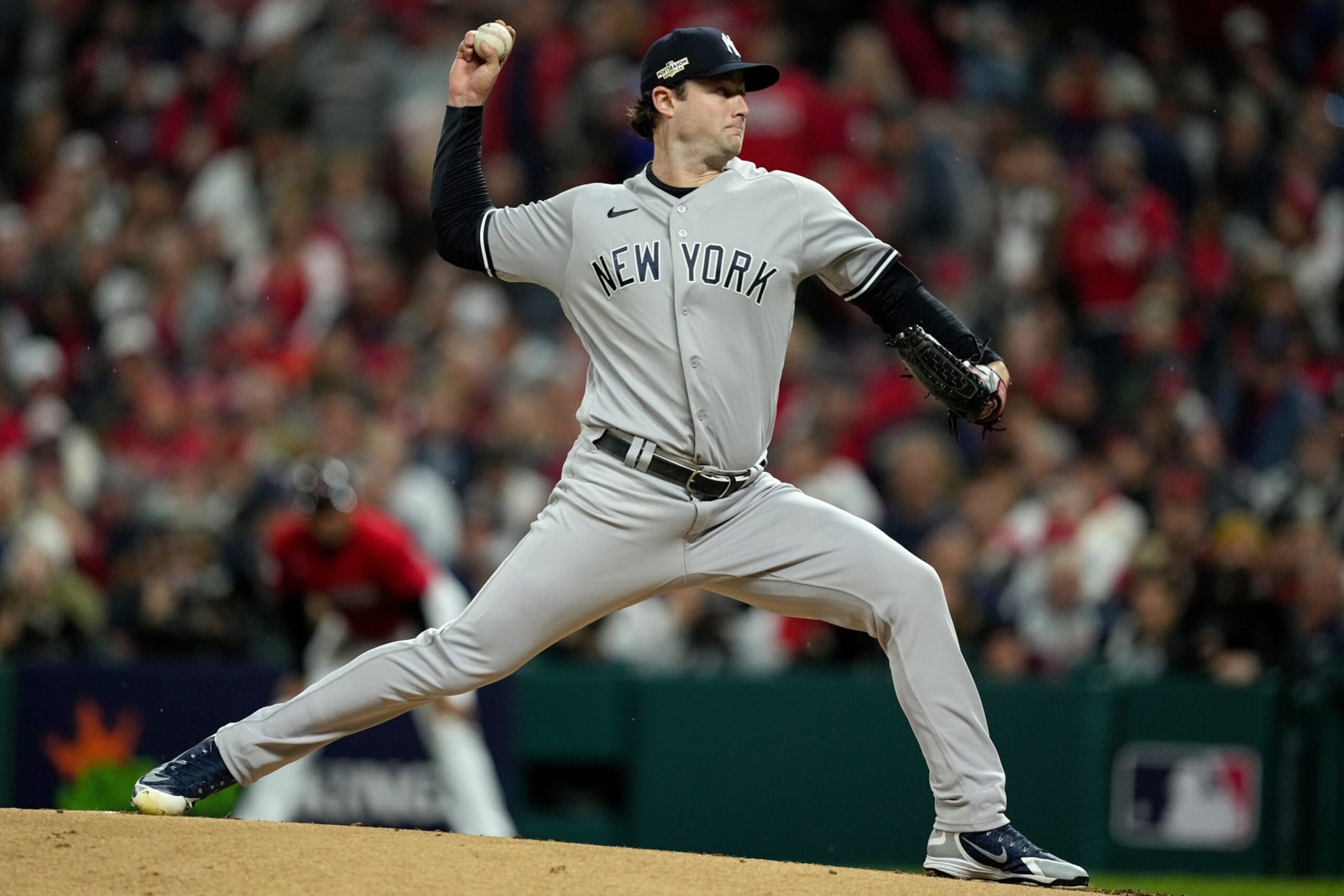 CLEVELAND, OHIO - OCTOBER 16: Gerrit Cole #45 of the New York Yankees delivers a pitch against the Cleveland Guardians during the first inning in game four of the American League Division Series at Progressive Field on October 16, 2022 in Cleveland, Ohio. (Photo by Dylan Buell/Getty Images)