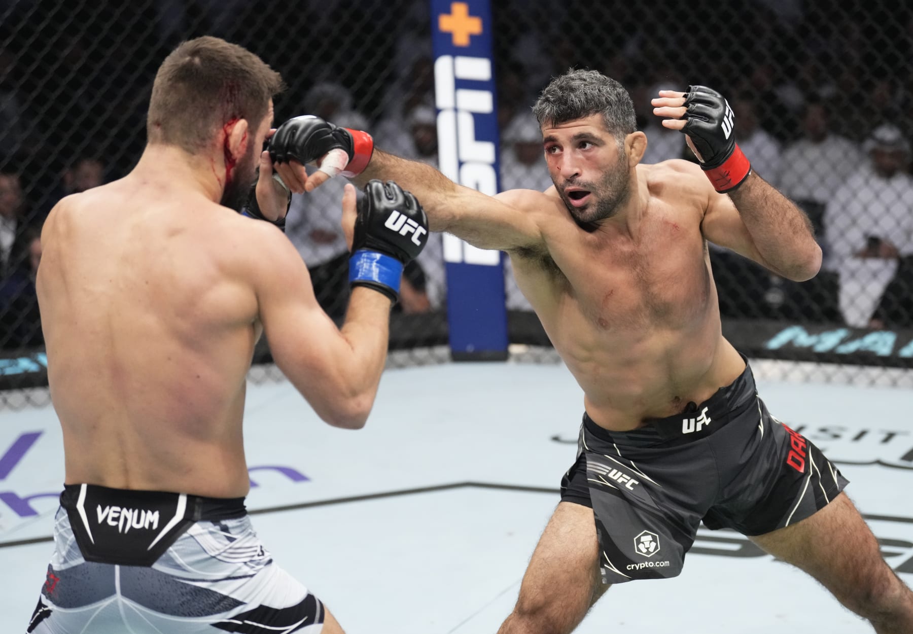 ABU DHABI, UNITED ARAB EMIRATES - OCTOBER 22: (R-L) Beneil Dariush of Iran punches Mateusz Gamrot of Poland in a lightweight fight during the UFC 280 event at Etihad Arena on October 22, 2022 in Abu Dhabi, United Arab Emirates. (Photo by Chris Unger/Zuffa LLC)