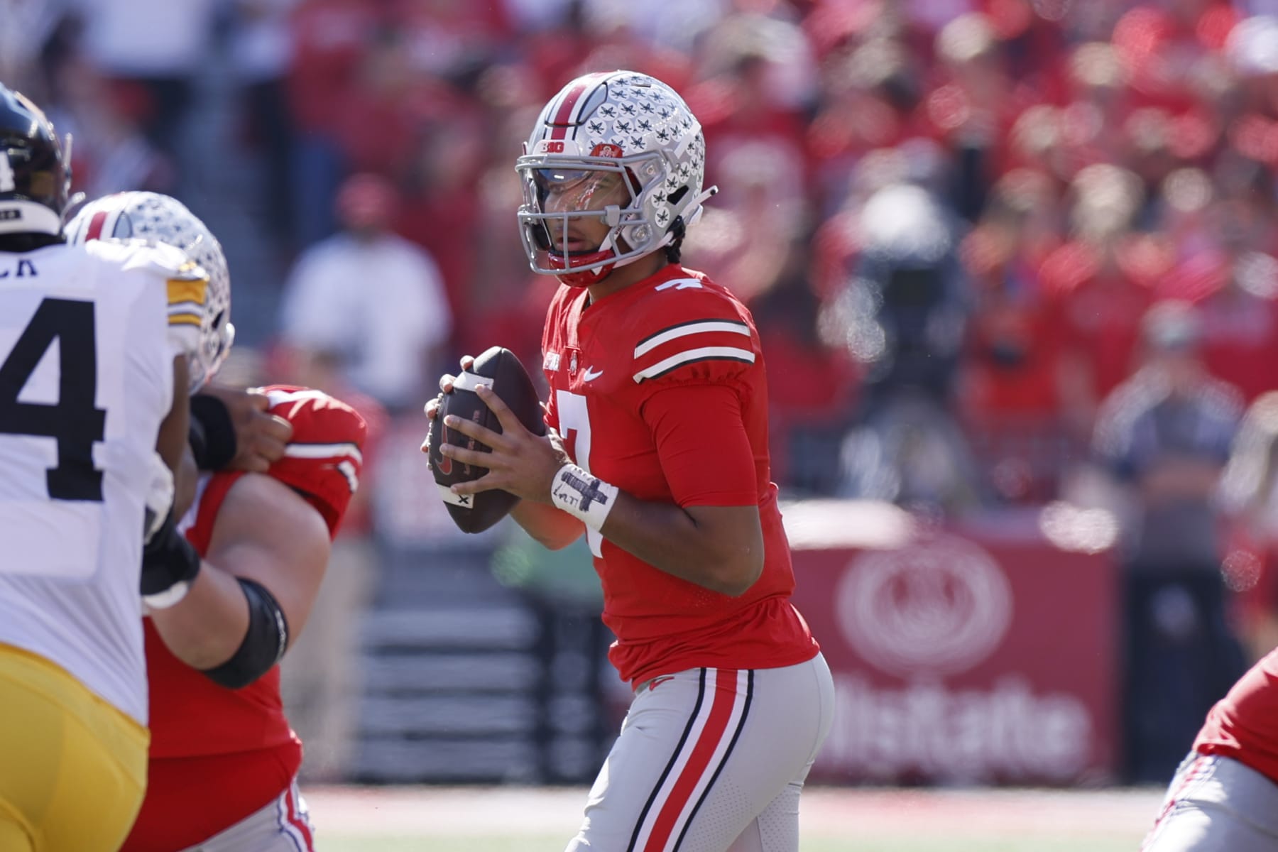 Ohio State quarterback C.J. Stroud looks for an open receiver against Iowa during the first half of an NCAA college football game Saturday, Oct. 22, 2022, in Columbus, Ohio. (AP Photo/Jay LaPrete)