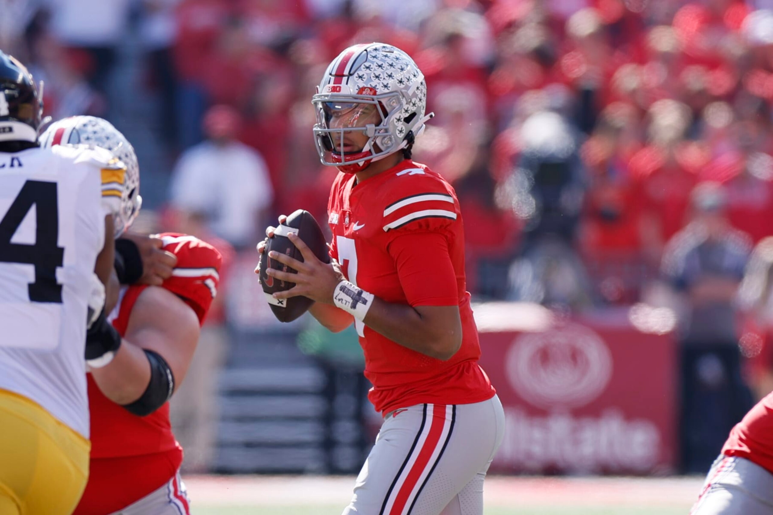Ohio State quarterback C.J. Stroud looks for an open receiver against Iowa during the first half of an NCAA college football game Saturday, Oct. 22, 2022, in Columbus, Ohio. (AP Photo/Jay LaPrete)