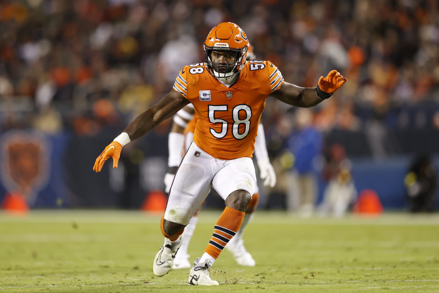 Chicago Bears linebacker Roquan Smith (58) runs on the field during the first half of an NFL football game against the Washington Commanders, Thursday, Oct. 13, 2022, in Chicago. (AP Photo/Kamil Krzaczynski)