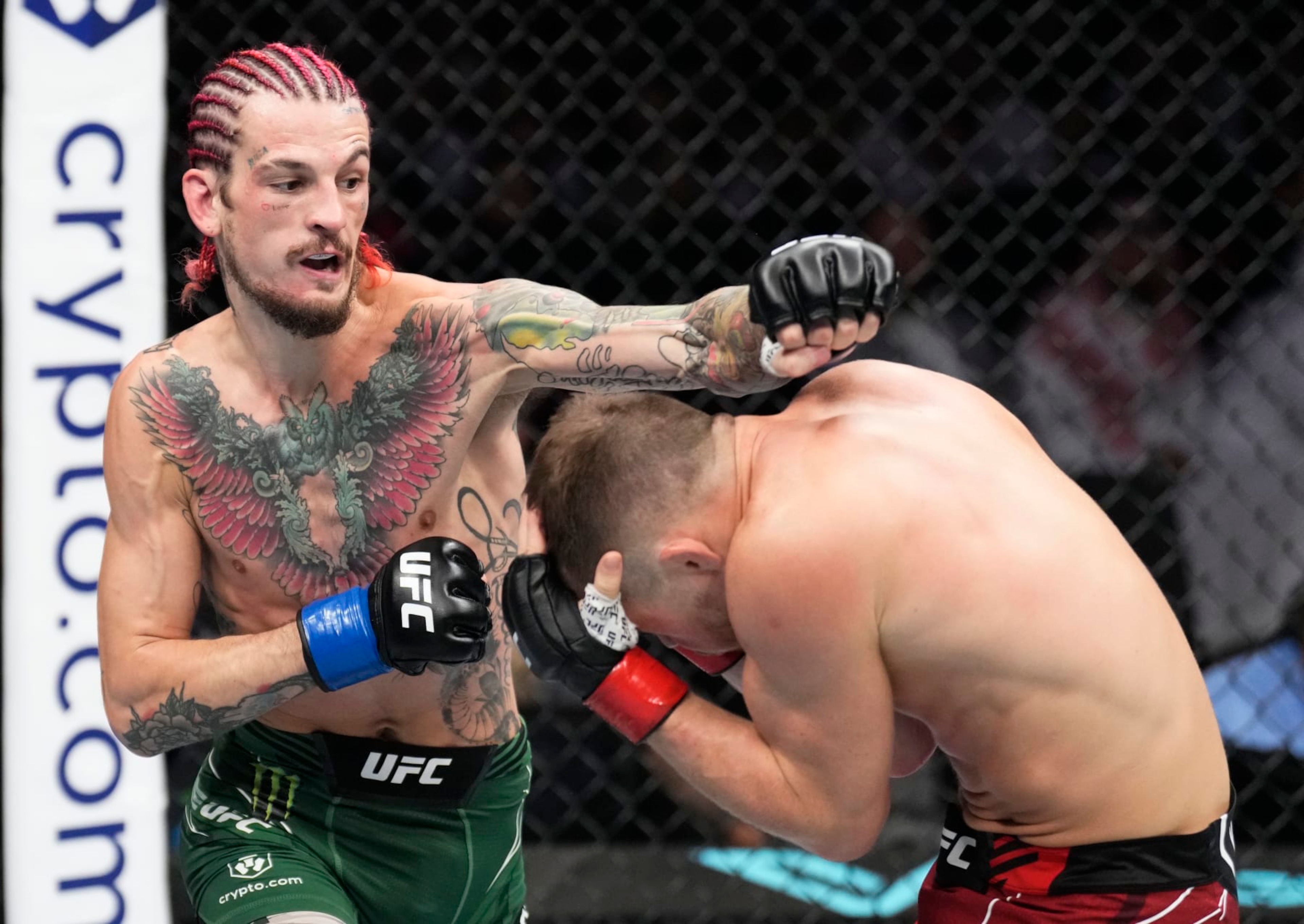 ABU DHABI, UNITED ARAB EMIRATES - OCTOBER 22: (L-R) Sean O'Malley punches Petr Yan of Russia in a bantamweight fight during the UFC 280 event at Etihad Arena on October 22, 2022 in Abu Dhabi, United Arab Emirates. (Photo by Chris Unger/Zuffa LLC)