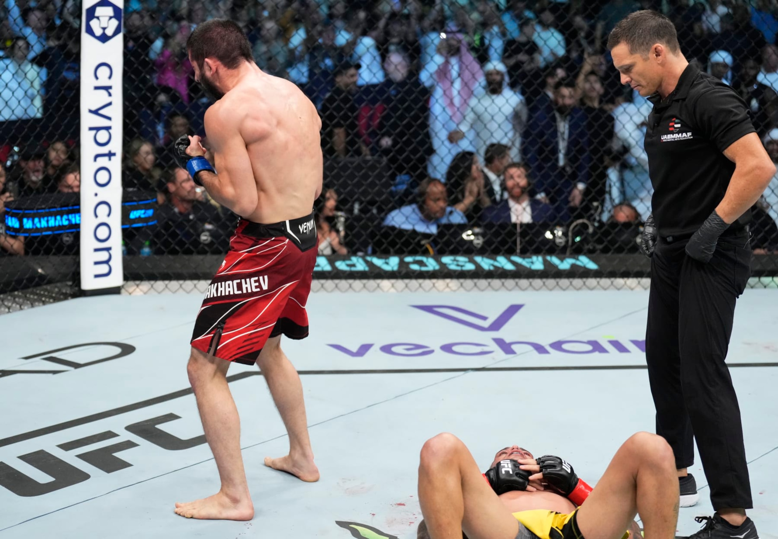 ABU DHABI, UNITED ARAB EMIRATES - OCTOBER 22: Islam Makhachev of Russia celebrates after his victory over Charles Oliveira of Brazil in their UFC lightweight championship fight during the UFC 280 event at Etihad Arena on October 22, 2022 in Abu Dhabi, United Arab Emirates. (Photo by Chris Unger/Zuffa LLC)