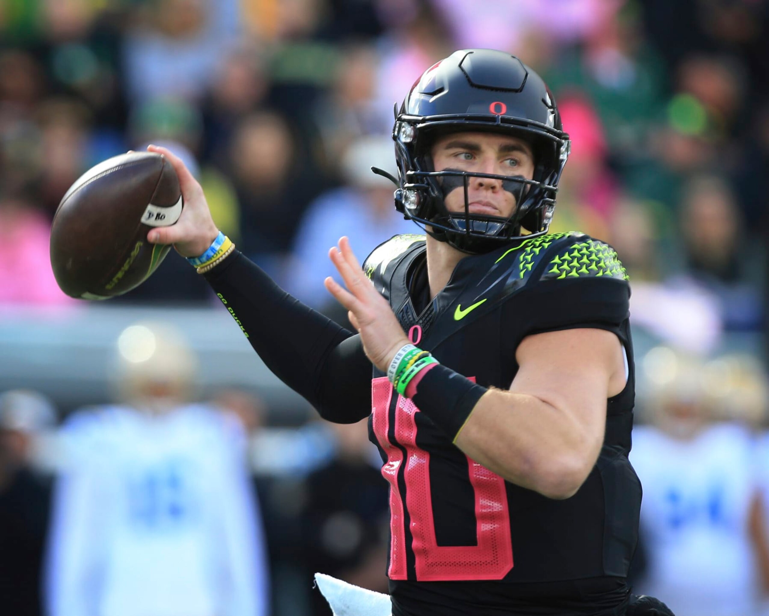 Oregon's Bo Nix throws down field against UCLA during the first half in an NCAA college football game Saturday, Oct. 22, 2022, in Eugene, Ore. (AP Photo/Chris Pietsch) Oregon's Bo Nix throws down field against UCLA during the first half in an NCAA college football game Saturday, Oct. 22, 2022, in Eugene, Ore. (AP Photo/Chris Pietsch)