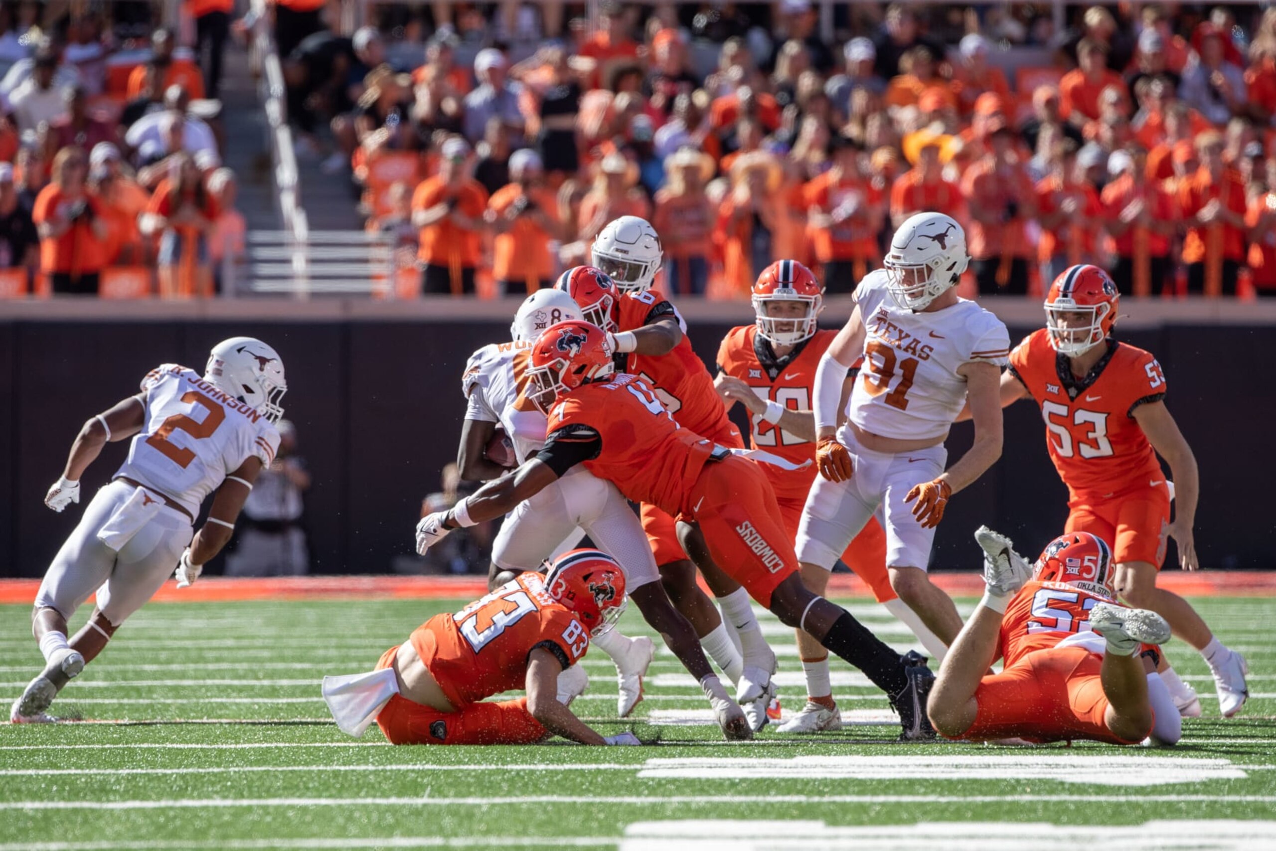 STILLWATER, OK - OCTOBER 22: Texas Longhorns and Oklahoma State Cowboys collide during the first half on October 22nd, 2022 at Boone Pickens Stadium in Stillwater, Oklahoma. (Photo by William Purnell/Icon Sportswire via Getty Images)