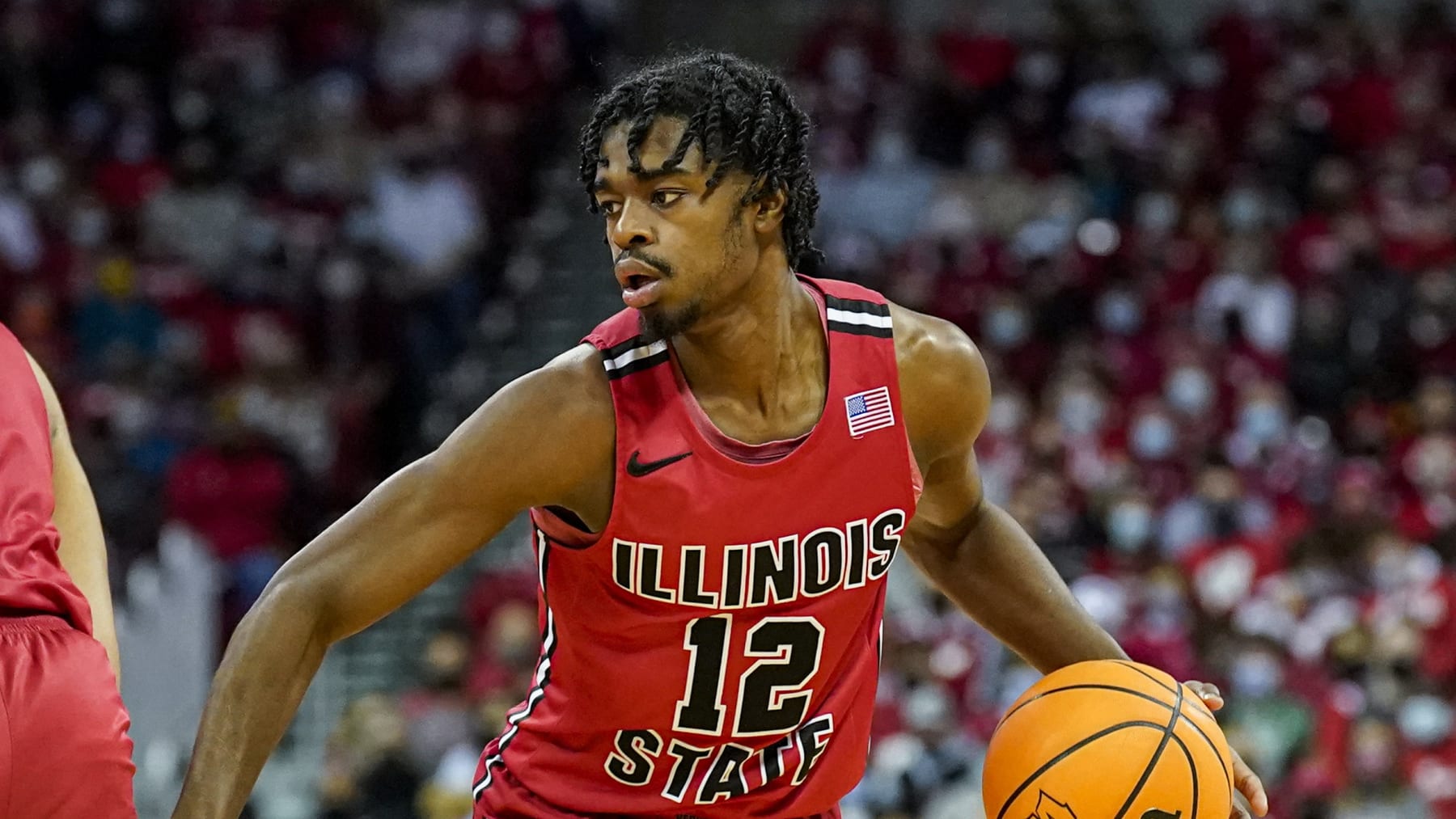 Illinois State's Antonio Reeves (12) during the first half of an NCAA college basketball game against Wisconsin Wednesday, Dec. 29, 2021, in Madison, Wis. (AP Photo/Andy Manis)