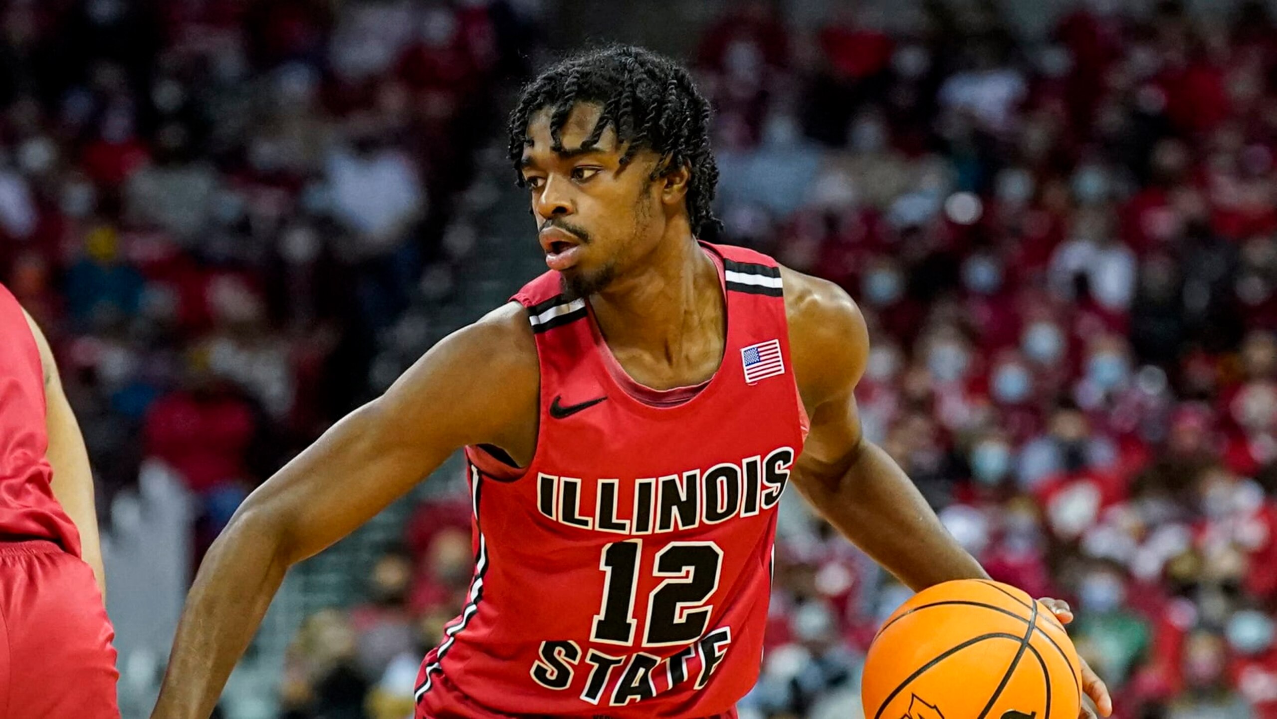 Illinois State's Antonio Reeves (12) during the first half of an NCAA college basketball game against Wisconsin Wednesday, Dec. 29, 2021, in Madison, Wis. (AP Photo/Andy Manis)