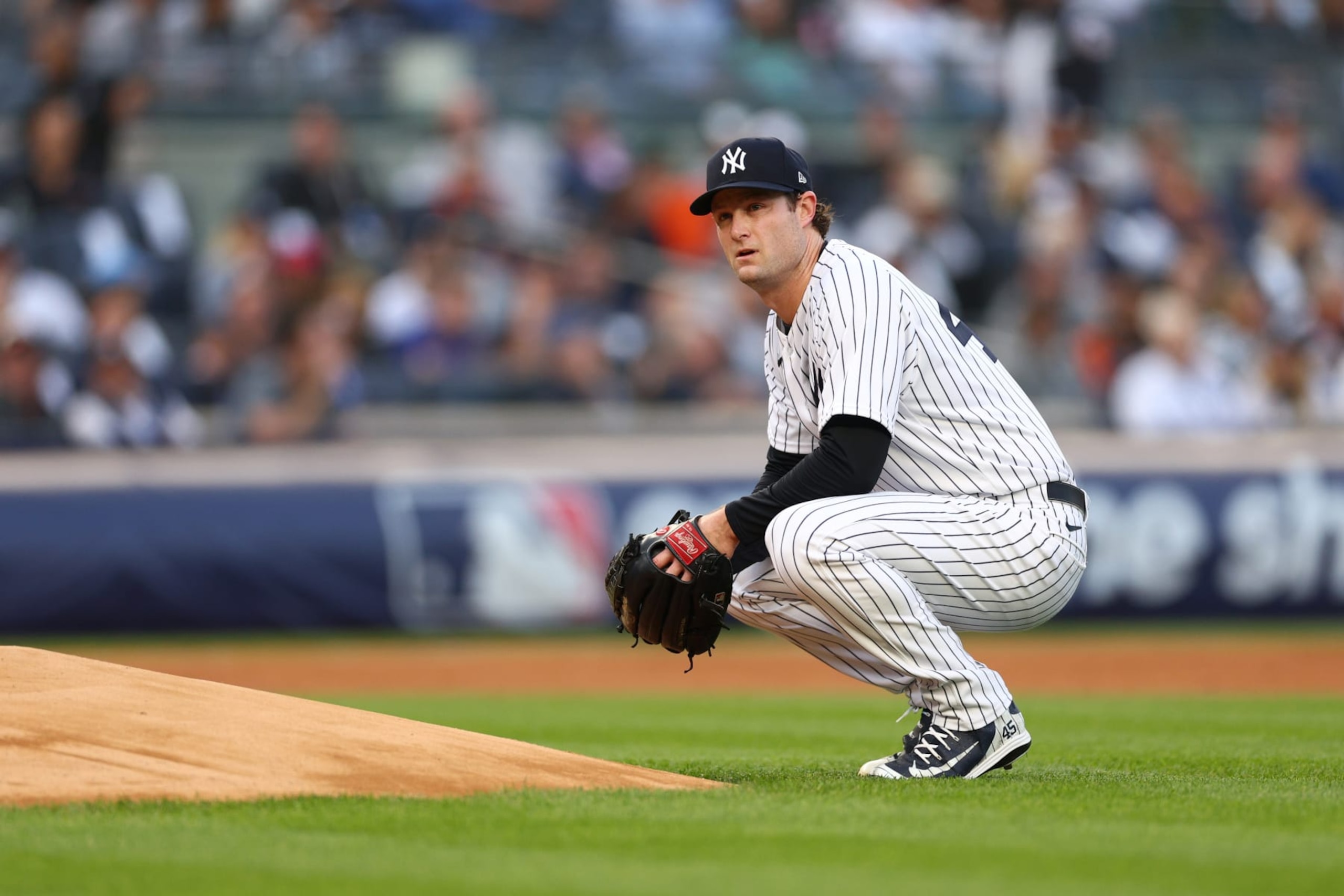 NEW YORK, NEW YORK - OCTOBER 22: Gerrit Cole #45 of the New York Yankees looks on between batters against the Houston Astros during the first inning in game three of the American League Championship Series at Yankee Stadium on October 22, 2022 in New York City. (Photo by Elsa/Getty Images)